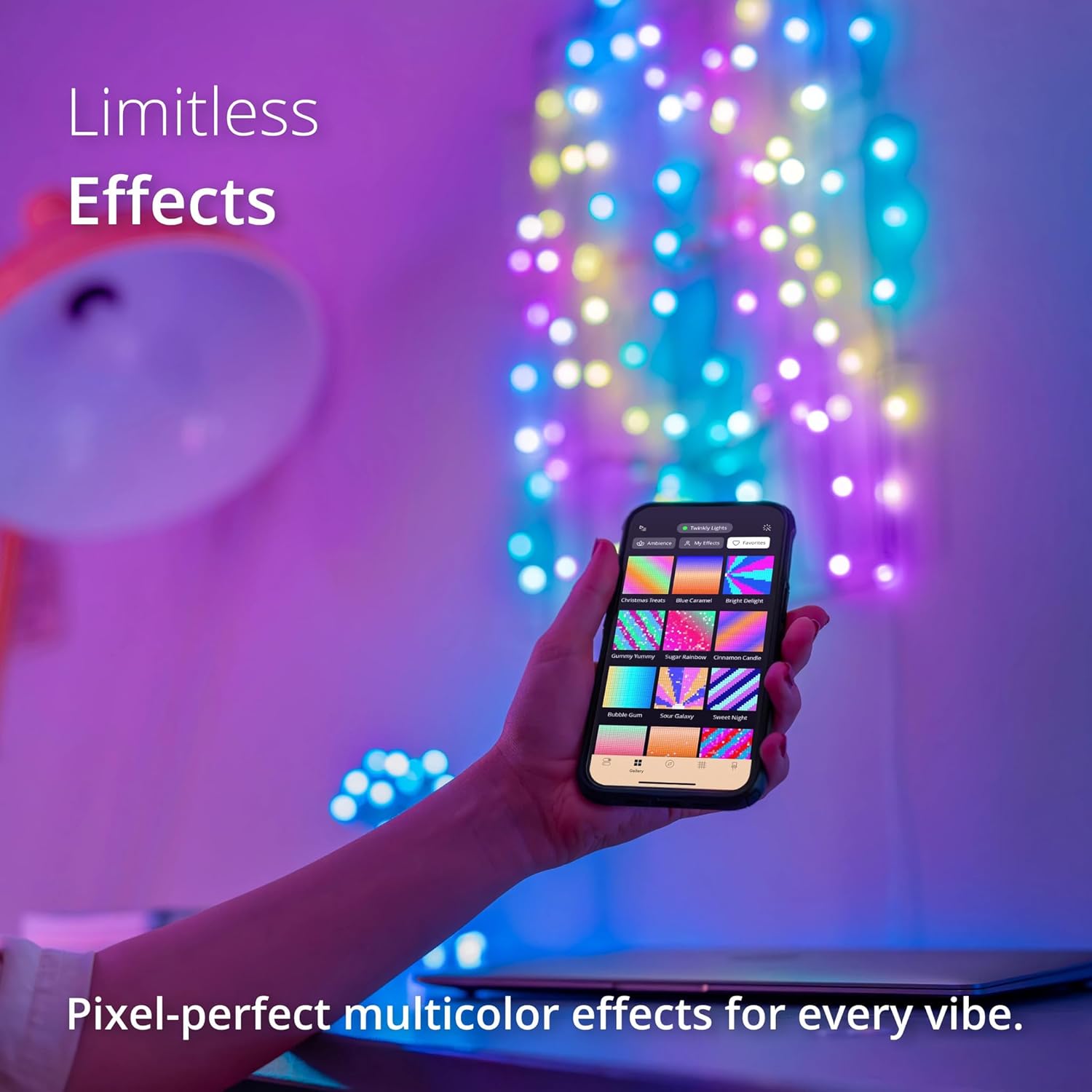 A smartphone displaying the Twinkly app with various light effect options, held by a hand in front of a wall with Twinkly lights.