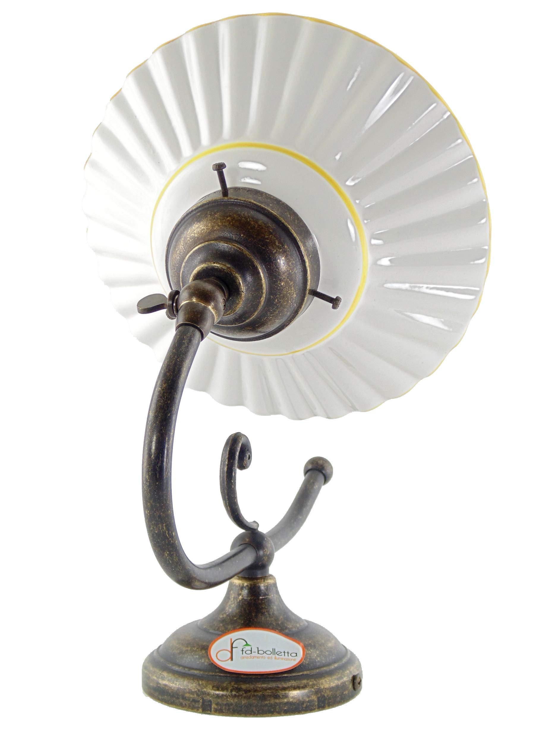Applique ottone brunito,lampada parete con piatto ceramica bordo giallo ar2.Misure:H 21,5cm,Ø piatto 19cm,sporgenza 29cm,Ø base 9,5cm.Le misure sono con piatto.Portalampade attacco Edison E14