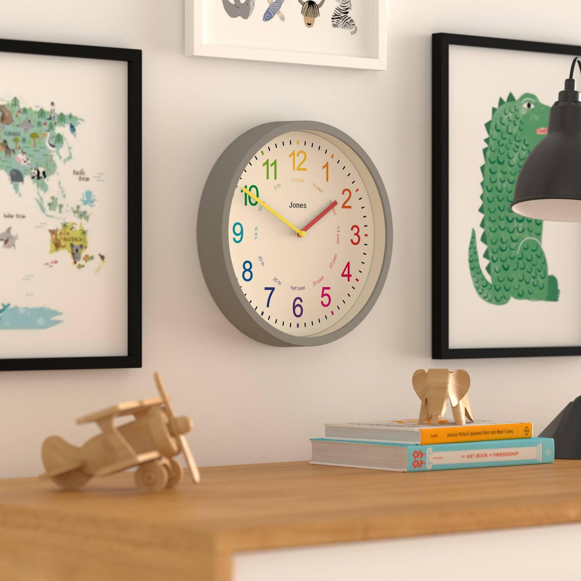 JONES CLOCKS® Kids Reloj de Pared | Pequeño Reloj Moderno para la guardería Infantil | 25cm | Grey | Dial Colorido para Aprender a medir la Hora