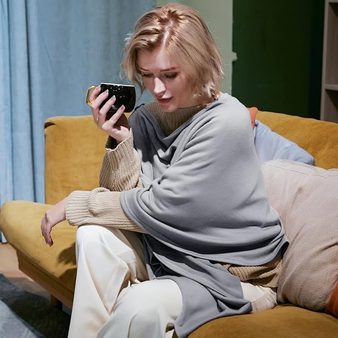 This poncho can be worn in multiple ways, making it a versatile piece that can be styled to suit your personal taste and outfit. It can be draped over the shoulders as a traditional poncho, wrapped around the neck as a scarf, or worn as a cardigan for a more layered look. The lightweight and easy-to-wear design makes it a convenient and practical choice for both casual and dressier occasions.