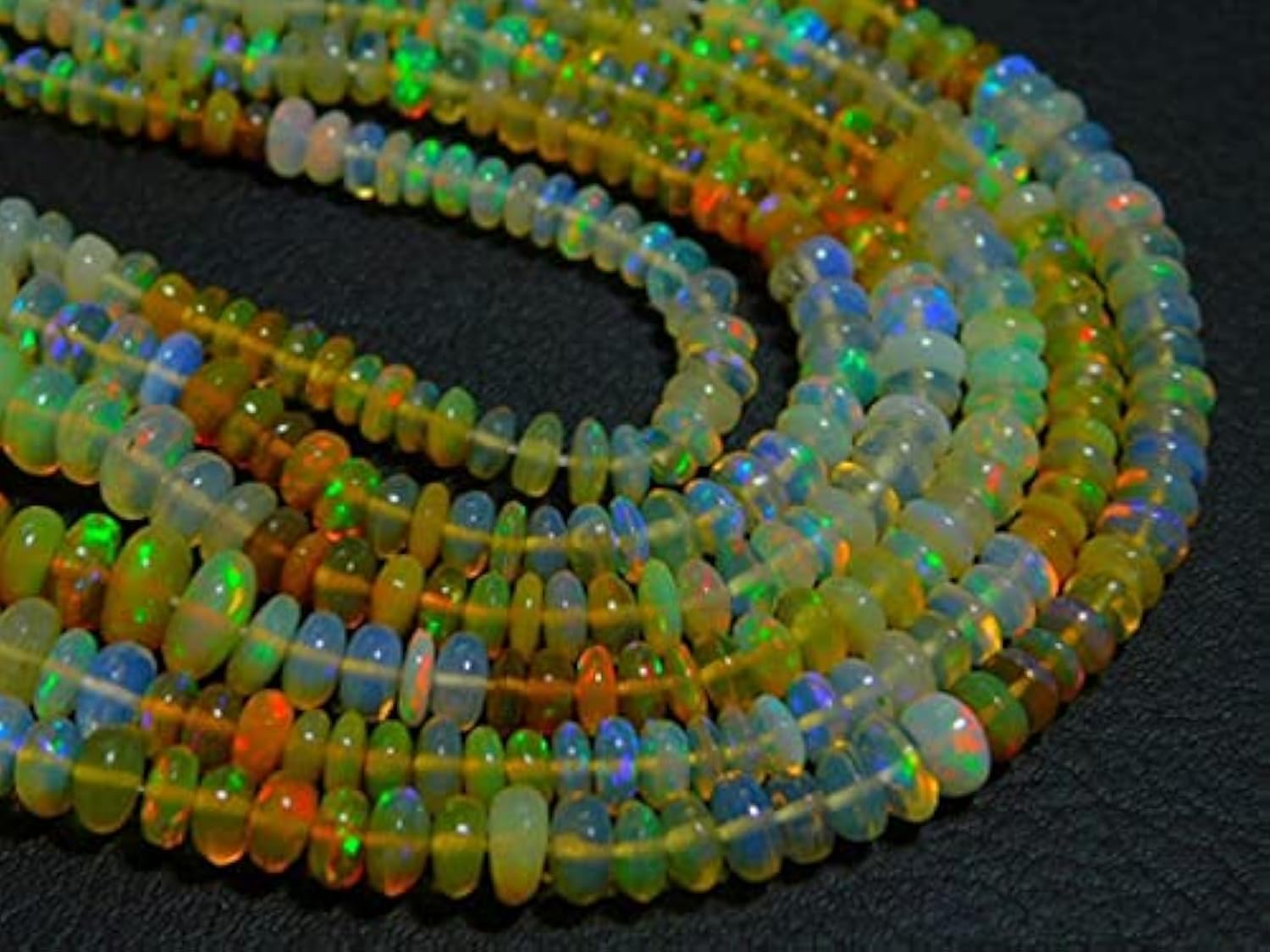 Opale de Welo éthiopienne naturelle en rang de perles rondelles lisses de 3 à 5 mm