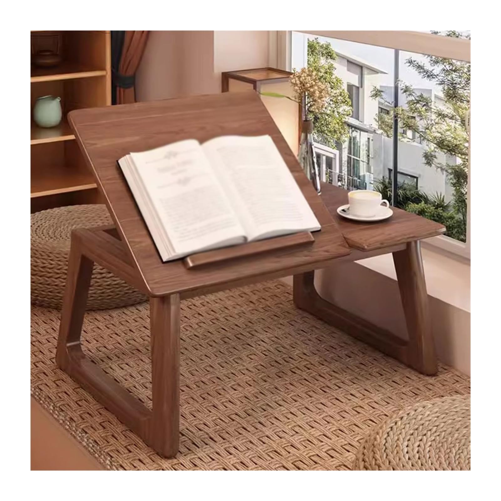 Mesa baja para ordenador portátil que soluciona la falta de espacio en casa