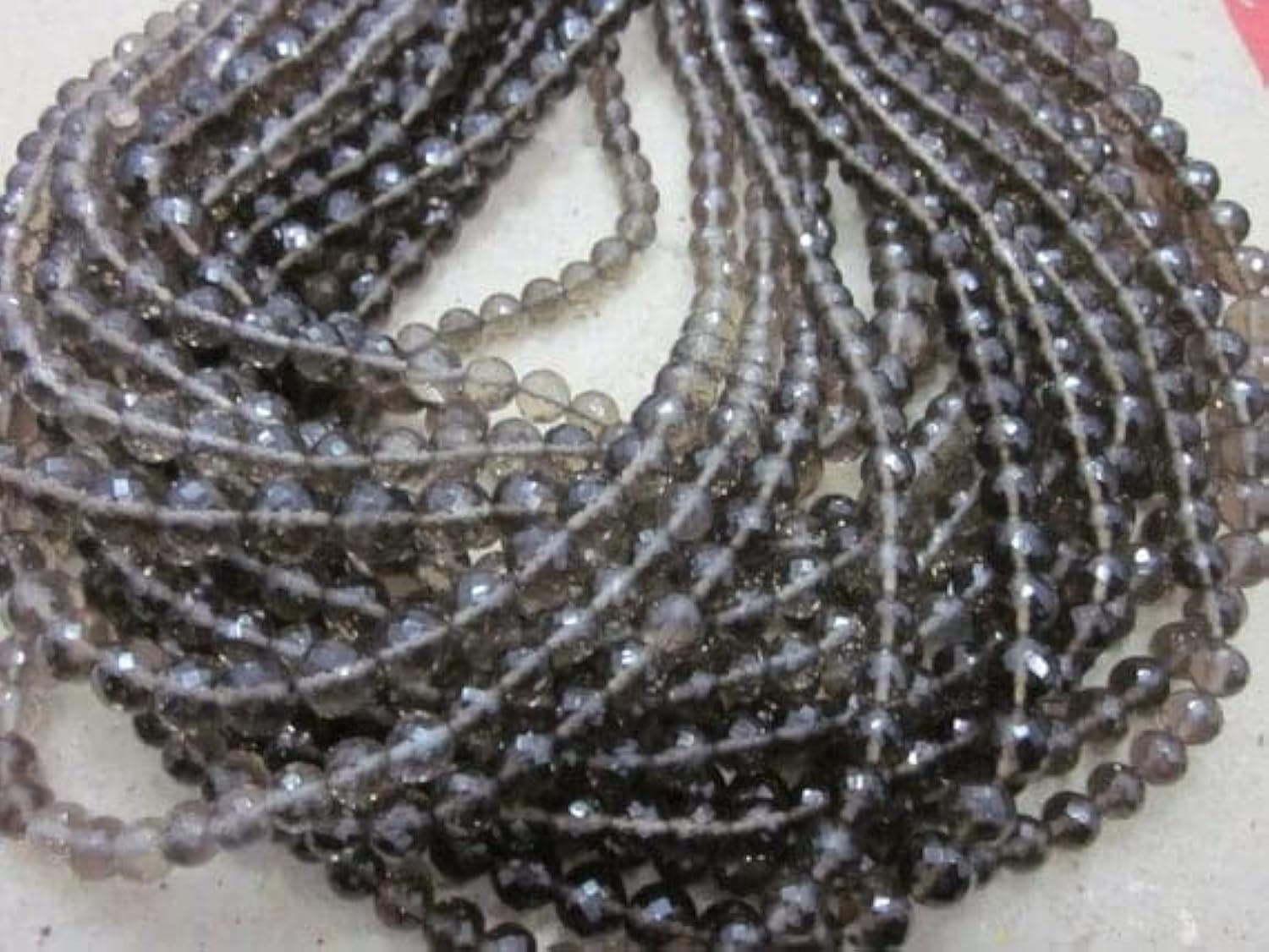 Perles smoky facettées 7-8mm pour créer vos bijoux de méditation