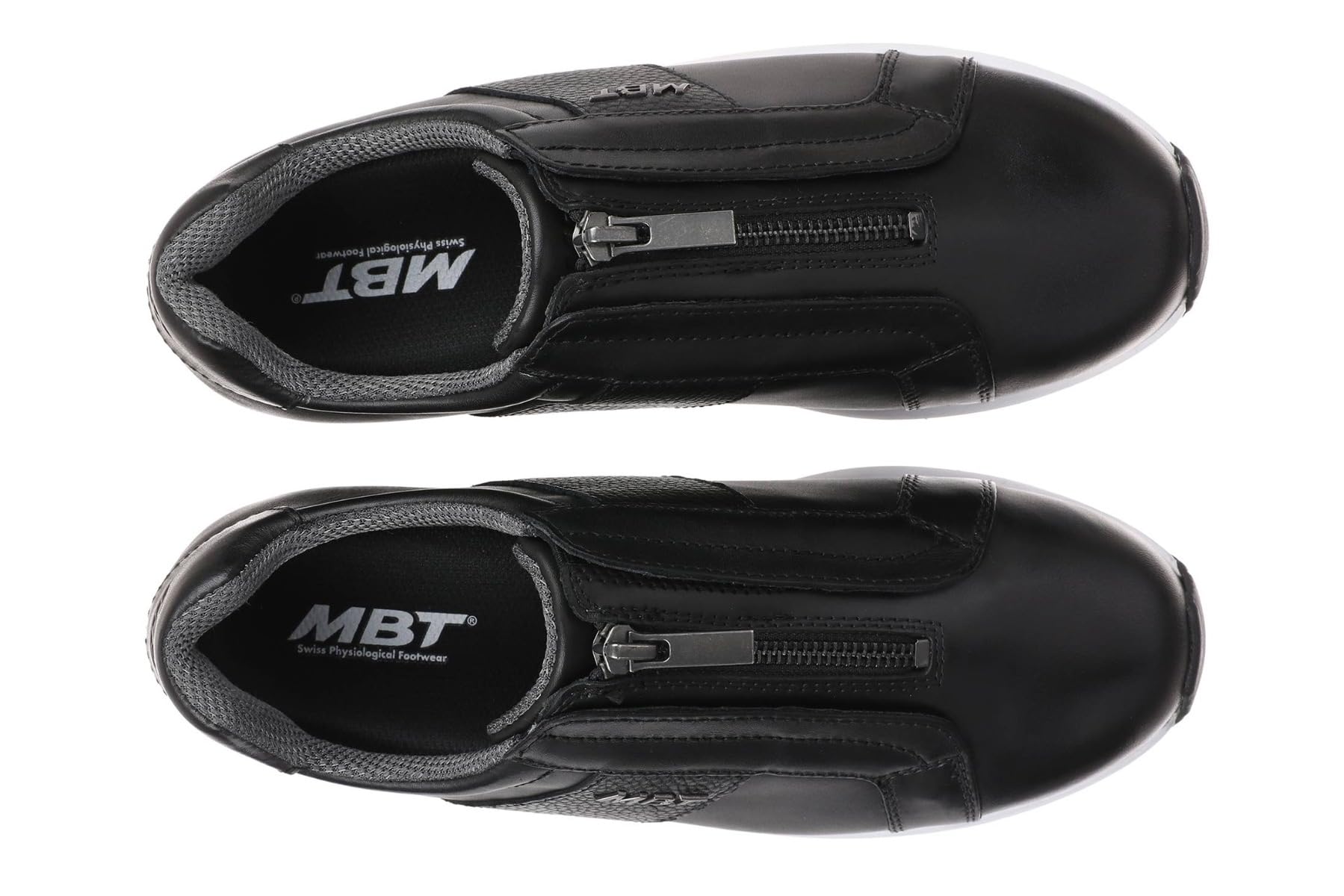 MBT AISAI Ledersneaker für Damen. Nappadesign mit Details aus Strukturiertem Leder. Frontaler Reißverschluss für leichten Einstieg.