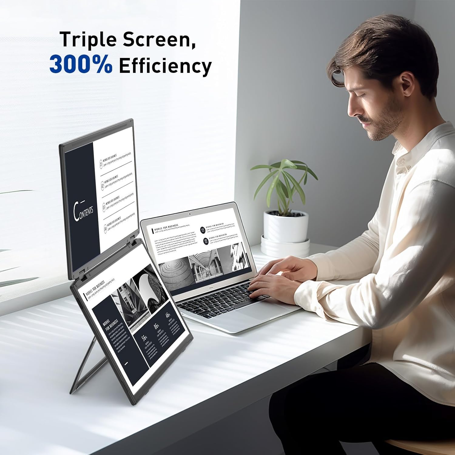 A person working with the Maxfree Dual Portable Monitor M4 in a vertical stacked configuration, demonstrating enhanced efficiency with a triple screen setup.