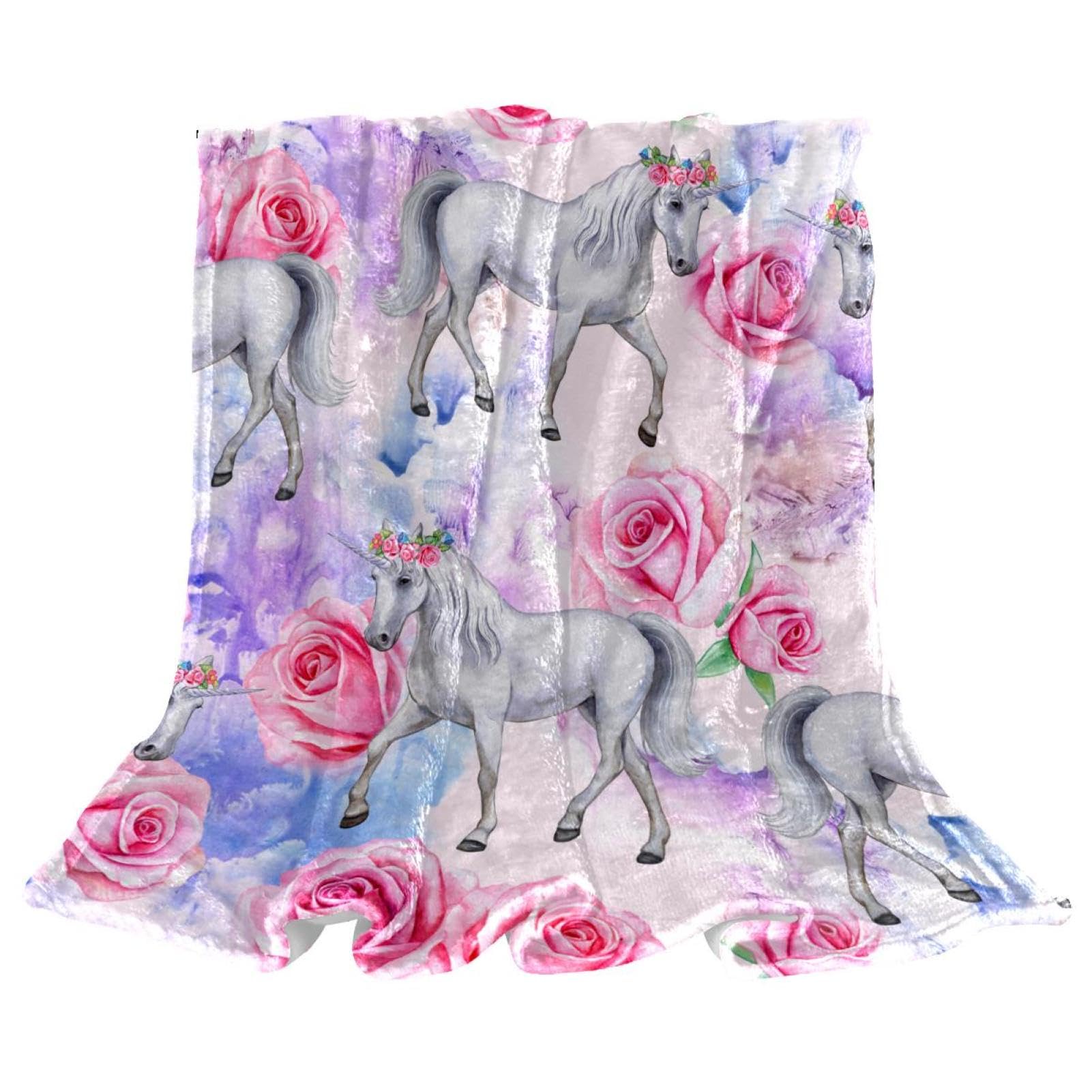 Couverture polaire rose licorne pour cocooning sur le canapé lors des soirées d'hiver douillettes