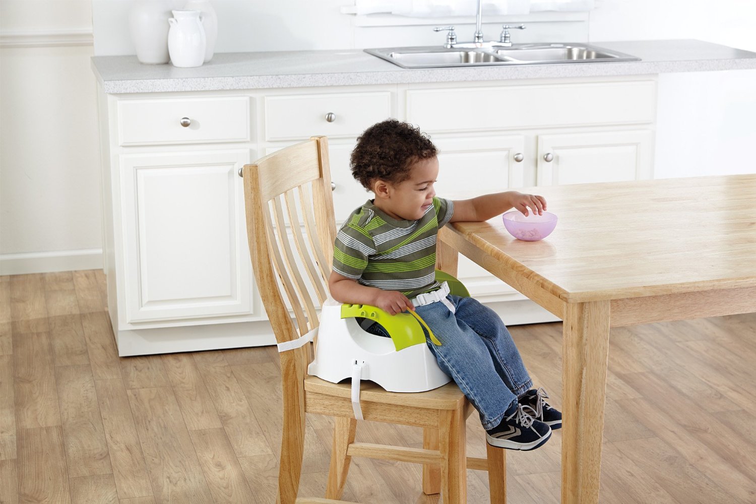 Fisher Price Asiento elevador portátil de limpieza rápida