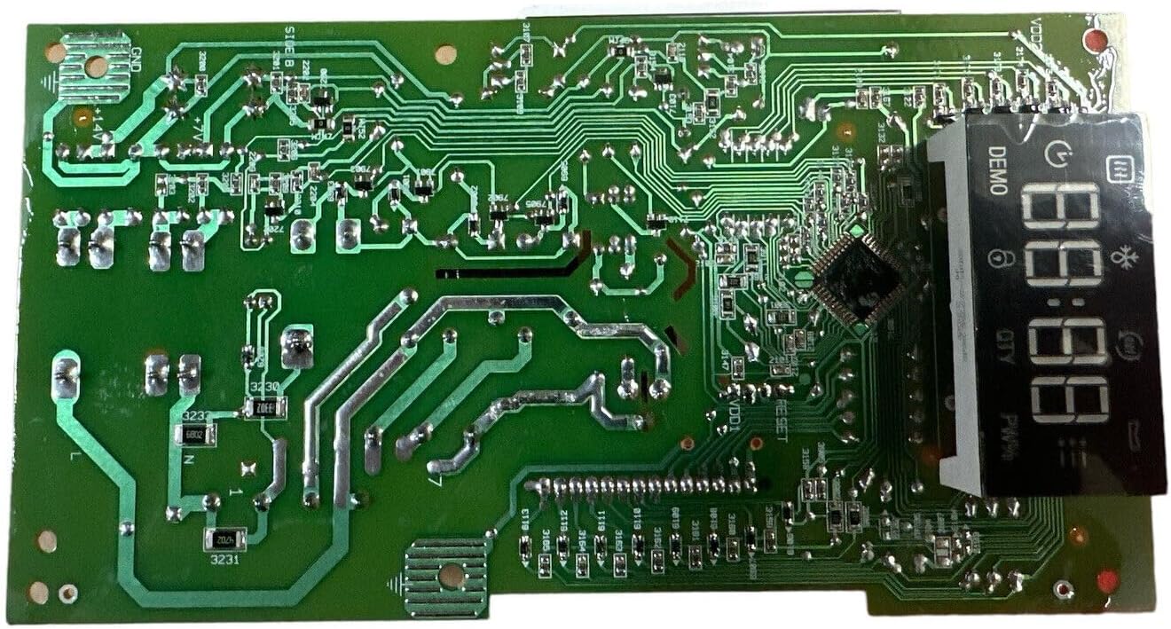 Bottom view of the Amesias W11552018 Whirlpool Control Board, displaying the green circuit board with soldered components and the digital display module.