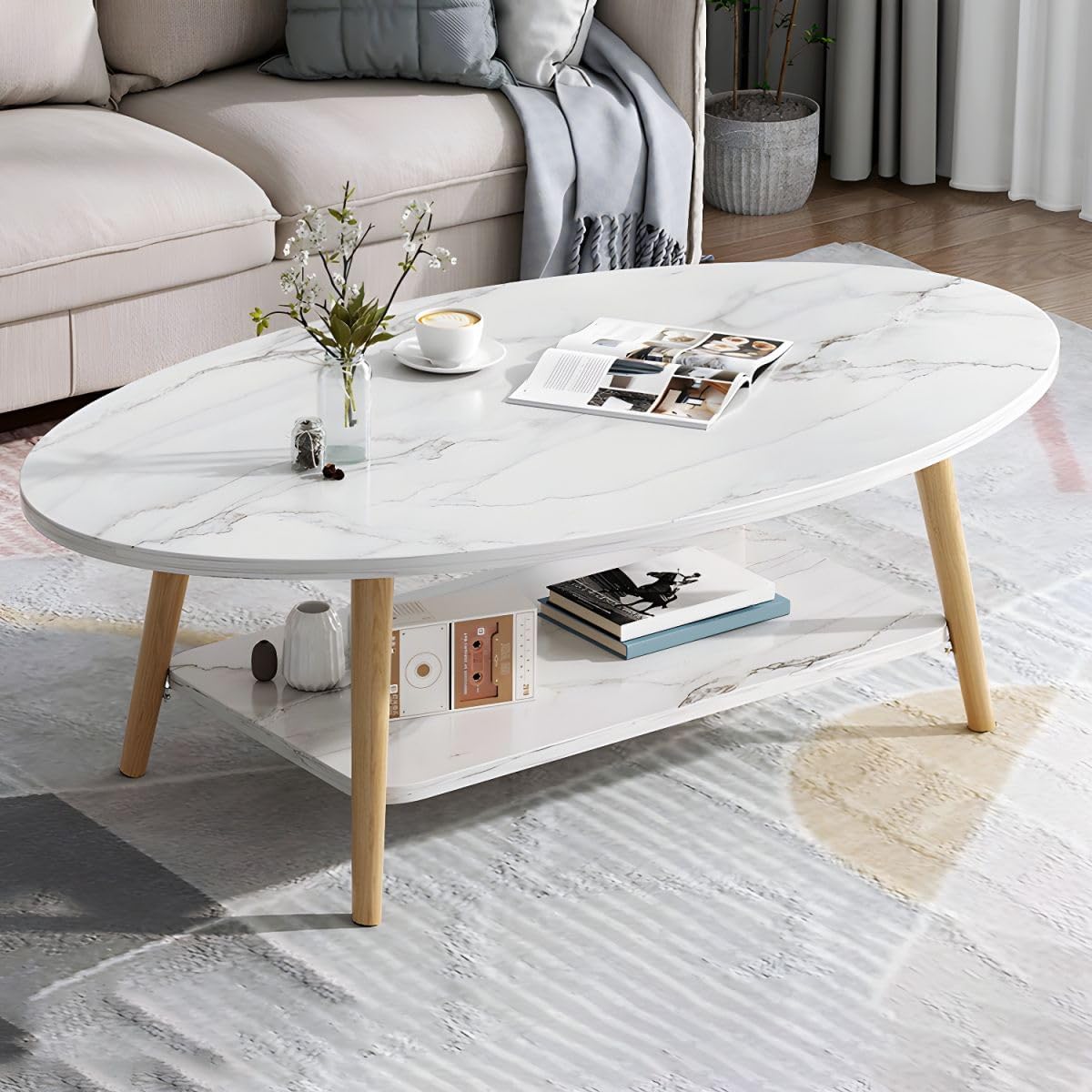 Nordic Style Wood Coffee Table with Marble Oval Shape Top and Shelf Creative Design for Apartment Living 47" L x 24" W x 16.5" H Modern Low Table for Living Room