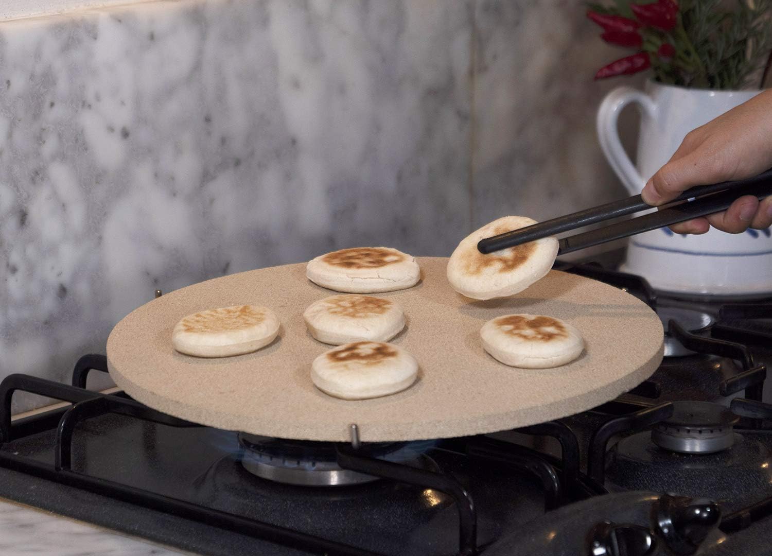 Rosaria® la Pietra Refrattaria, per Riscaldare e cuocere Pizza, Piadina e  Tigelle su Fornello di casa e in Forno - Ø 32 cm : Amazon.it: Casa e cucina
