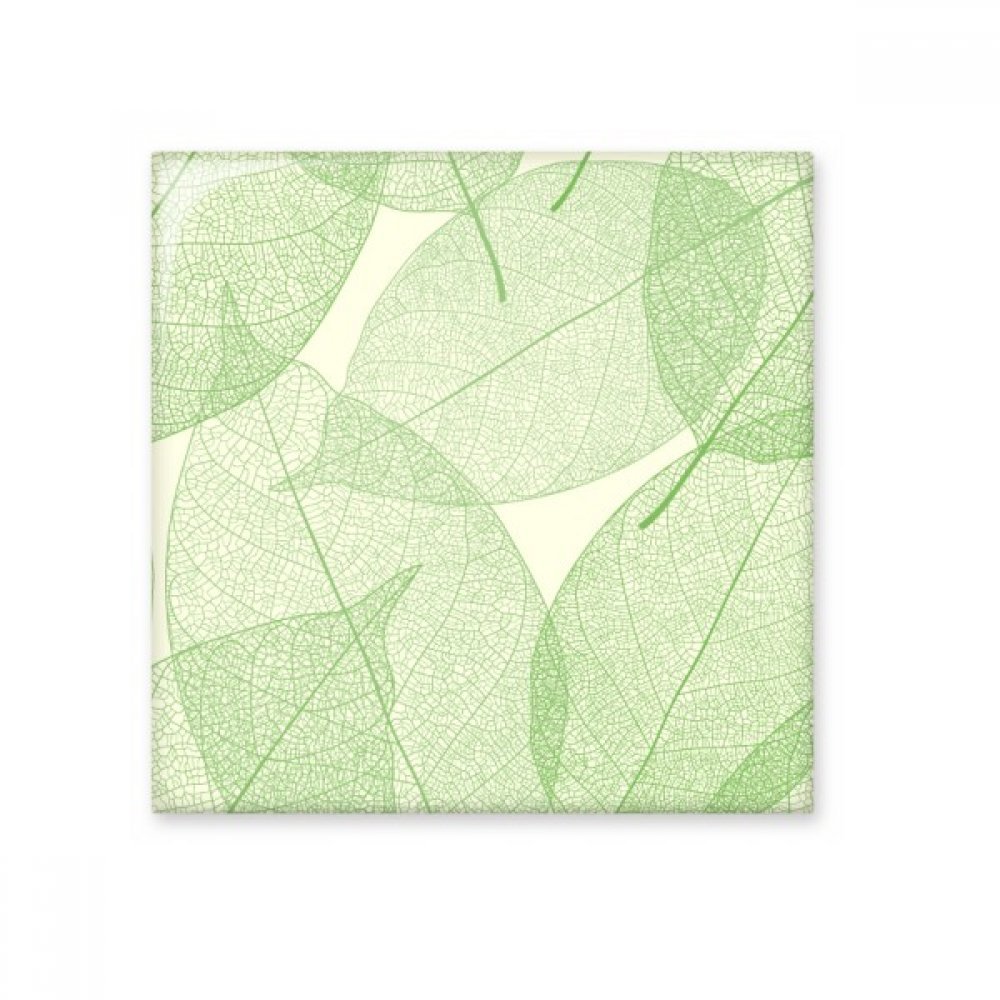Carreaux de céramique avec motif feuilles vertes pour rafraîchir le décor de votre cuisine