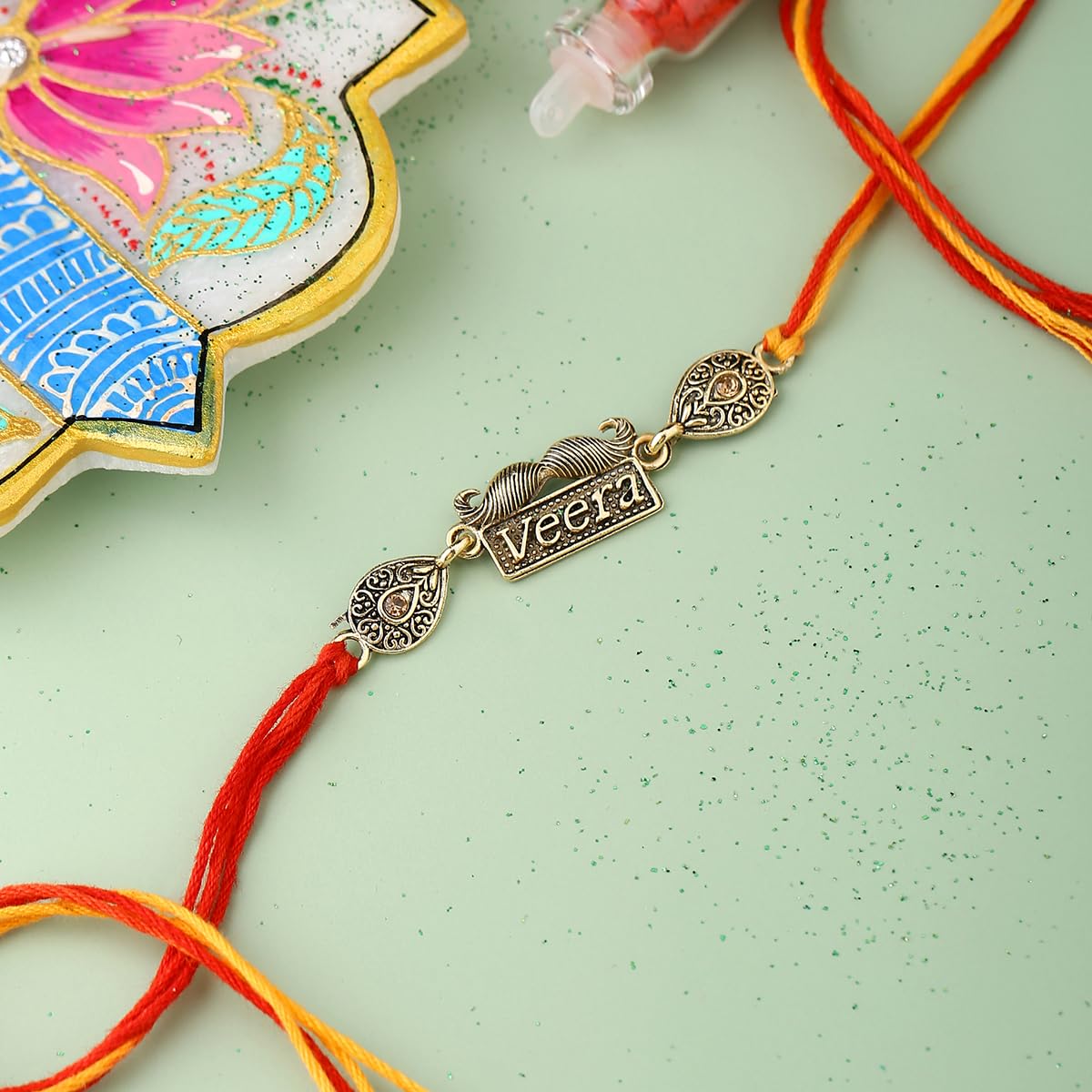 Antique Veera Rakhi With Roli Chawal Pack