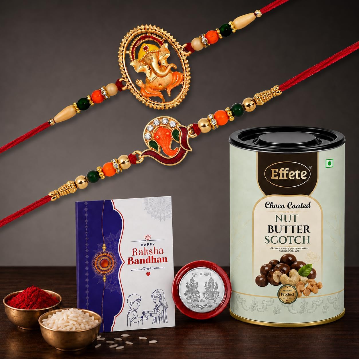 Designer Ganesha Rakhi Set of 2 for Brother with Choco Coated Nut Butterscotch Chocolate 96gm, Pooja Coin, Roli Chawal & Card | Rakhi with Chocolate Combo for Raksha Bandhan