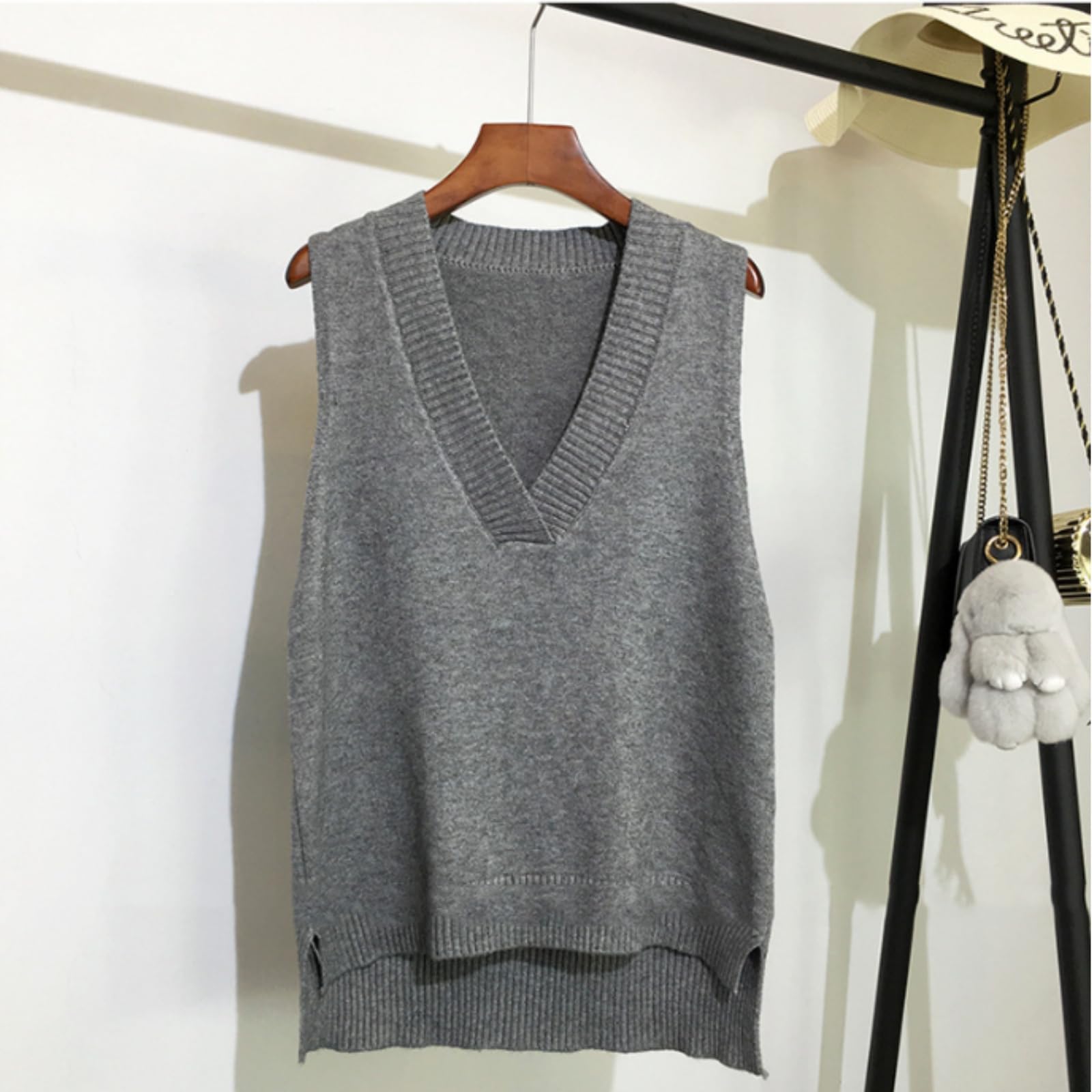 Dawwoti Femme Pulls sans Manches Col V Gilet Sweat Tricot Gilet Top Ourlet irrégulier Couleur Unie
