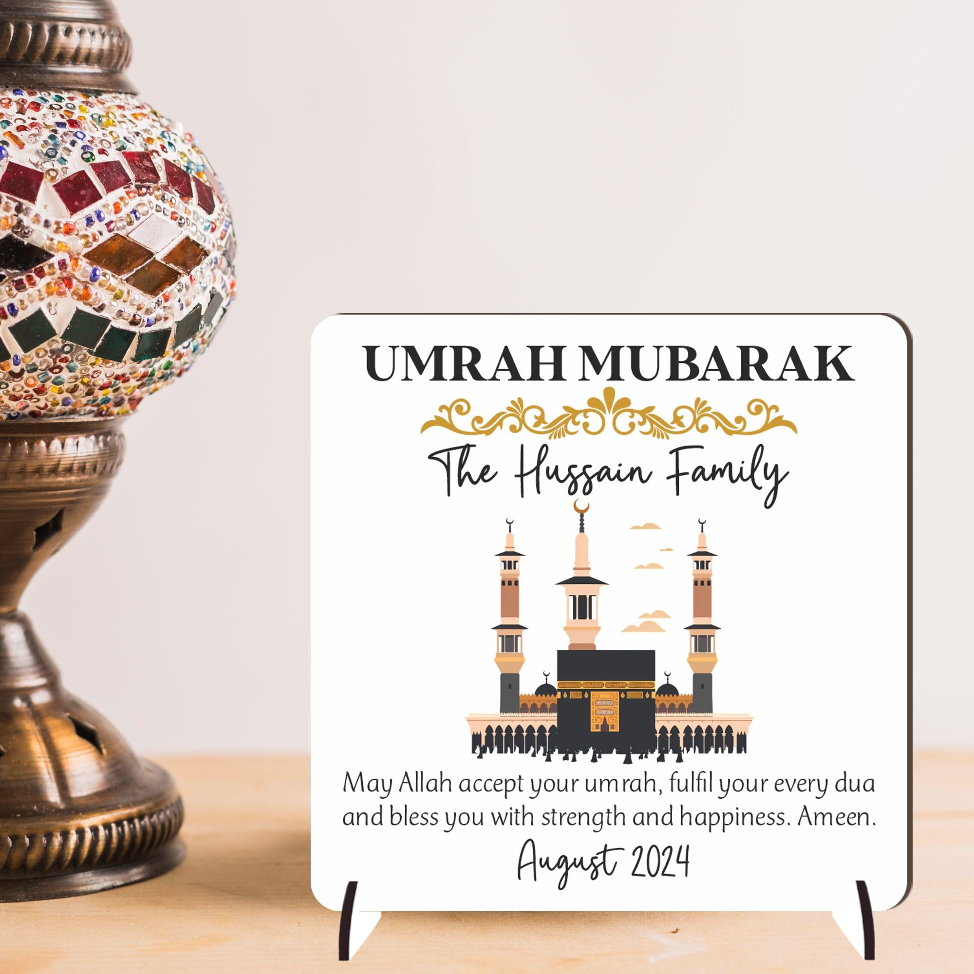 Personalised Umrah Mubarak Plaque – Kaaba and Floral Design, Custom Names, Arabic Calligraphy Keepsake, Square 9.5cm Plaque for Umrah Celebrations (Black & Gold, MDF Wood (Indoor use only))