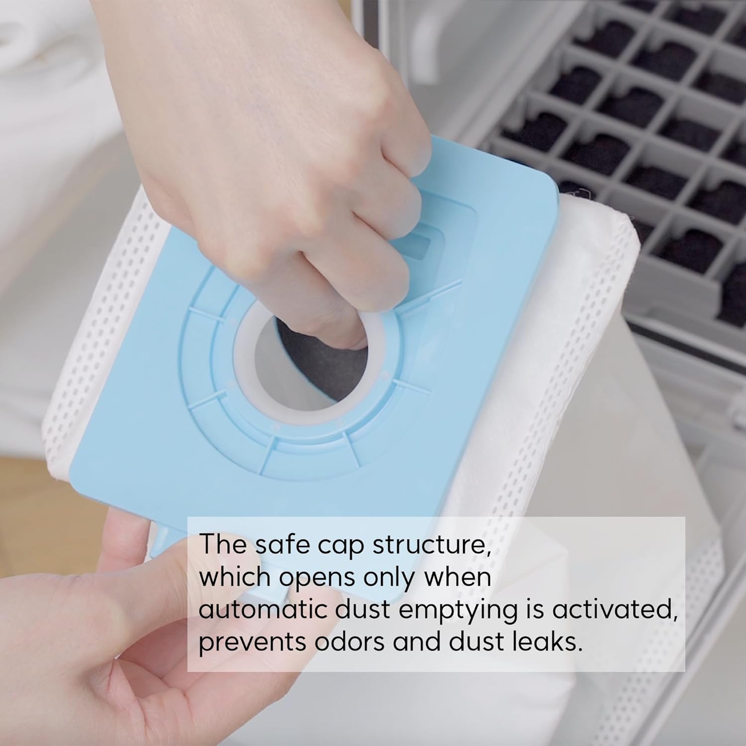 A close-up of a CATCHWELL LIFE vacuum bag's light blue plastic top, showing the circular opening and the 'PULL' tab, with a hand demonstrating the self-sealing feature.