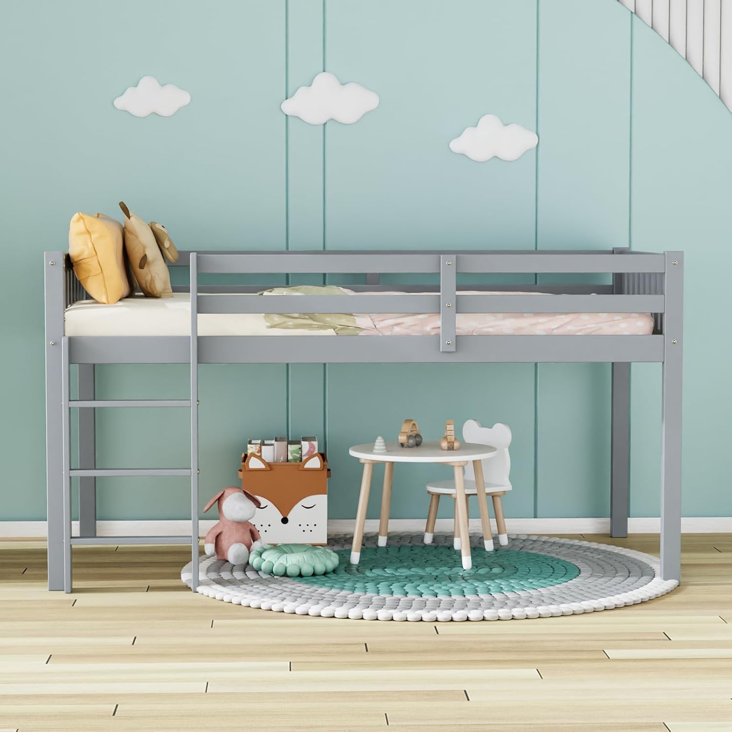 Child sitting on the bed with a book, showing the 13.8 inch tall guardrail