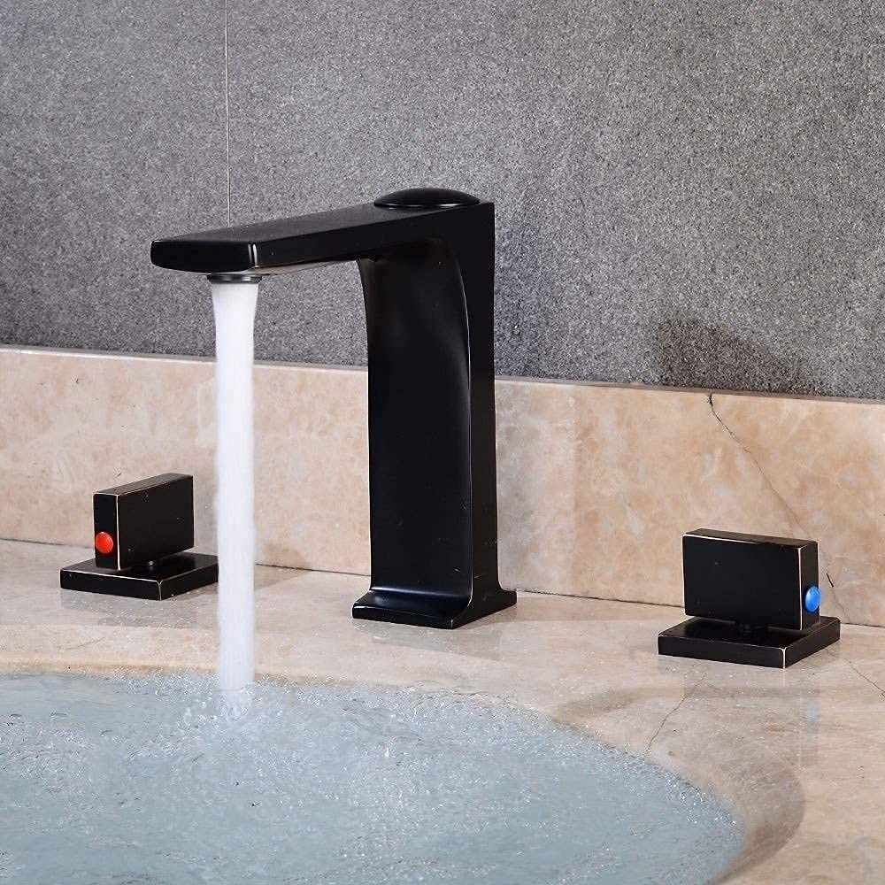 Grifo de lavabo de tres orificios en color negro para baños modernos