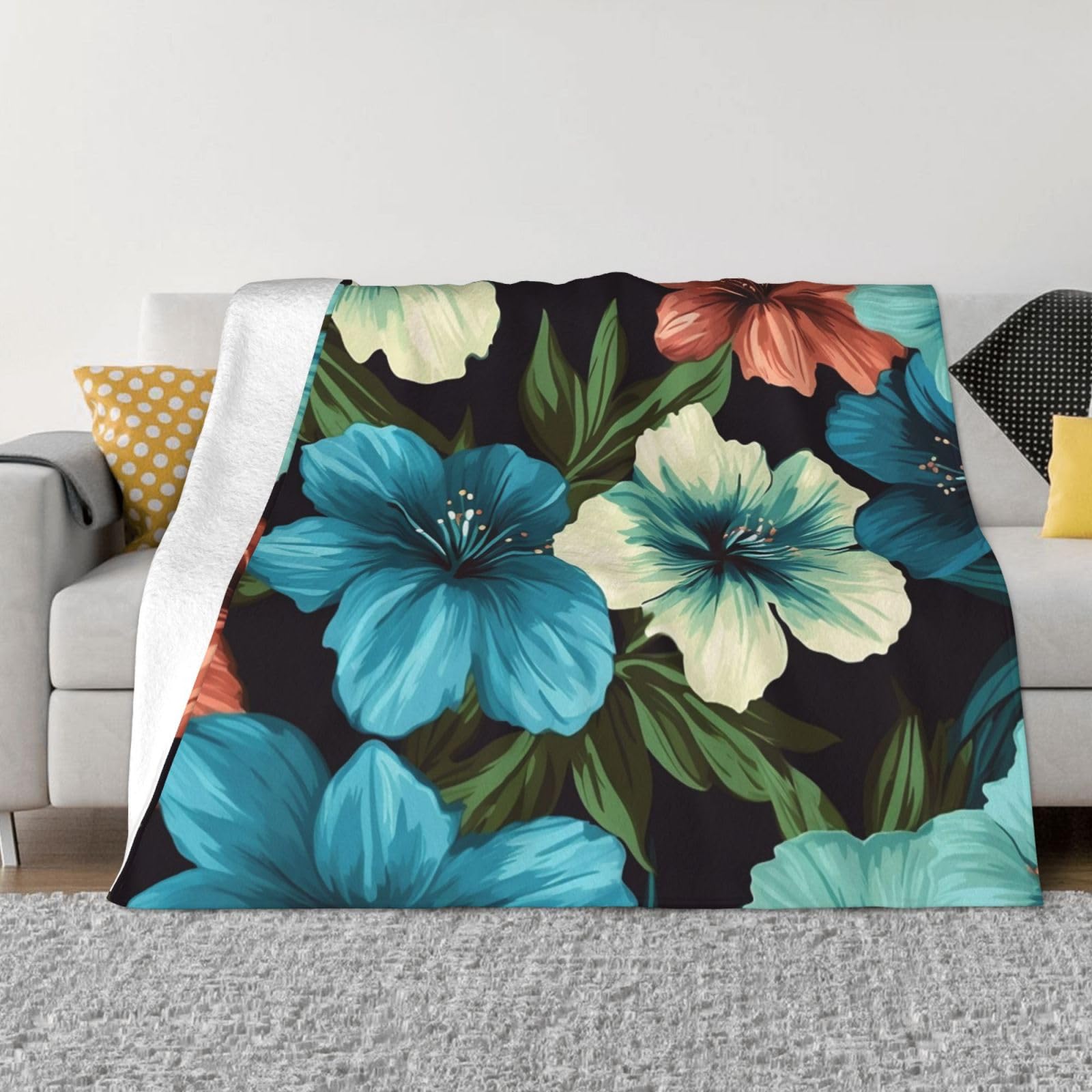 Couverture en flanelle fleurs d'hibiscus pour vos soirées cocooning sur le canapé