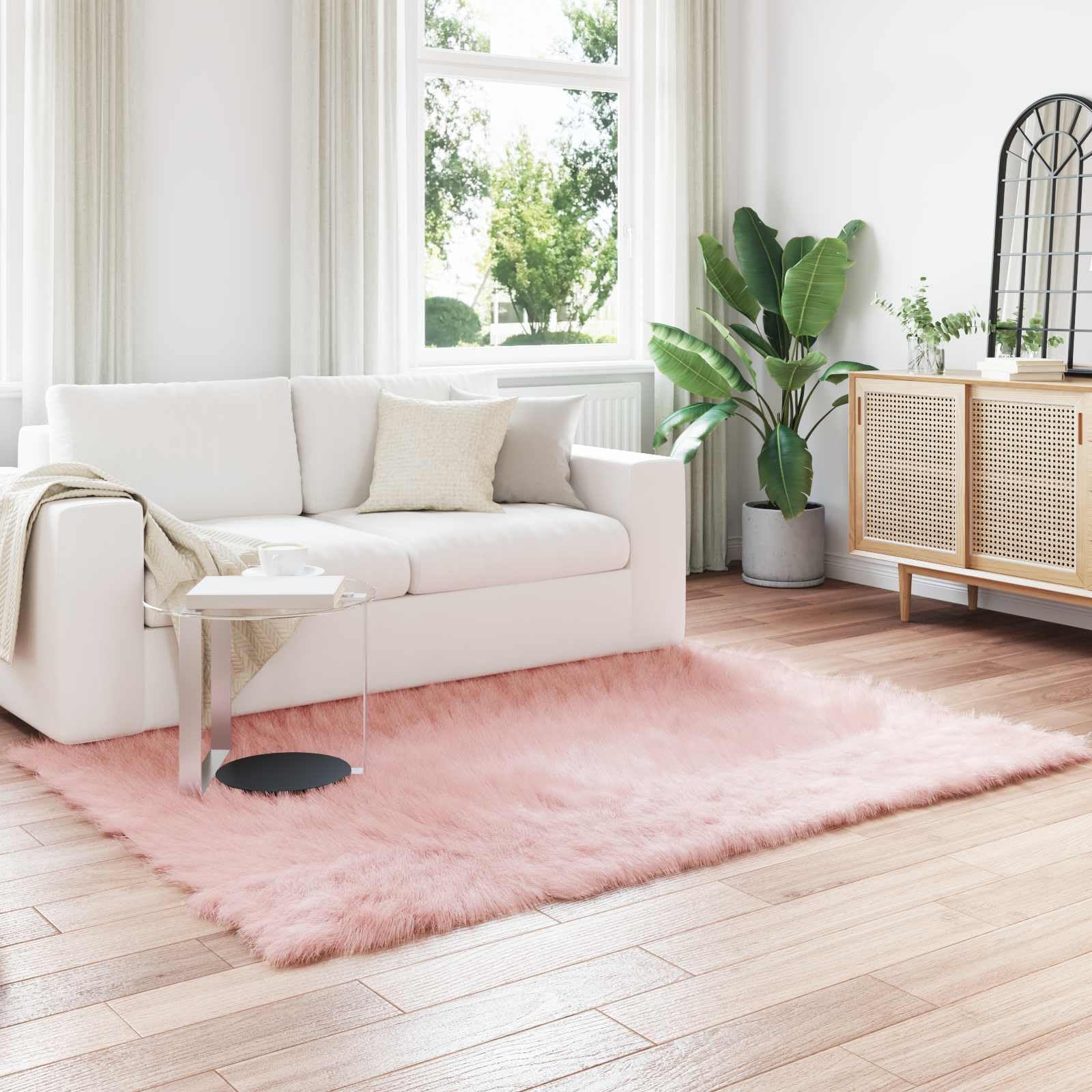Tapis en peau de mouton synthétique rose 140x200 moderne salon TAFALLA