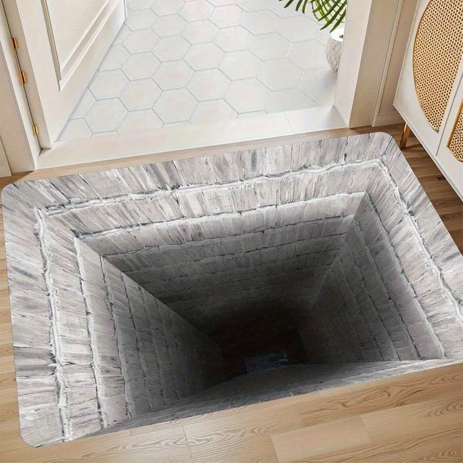 Tapis à illusion d'optique 3D antidérapant pour sécuriser et habiller un sol glissant