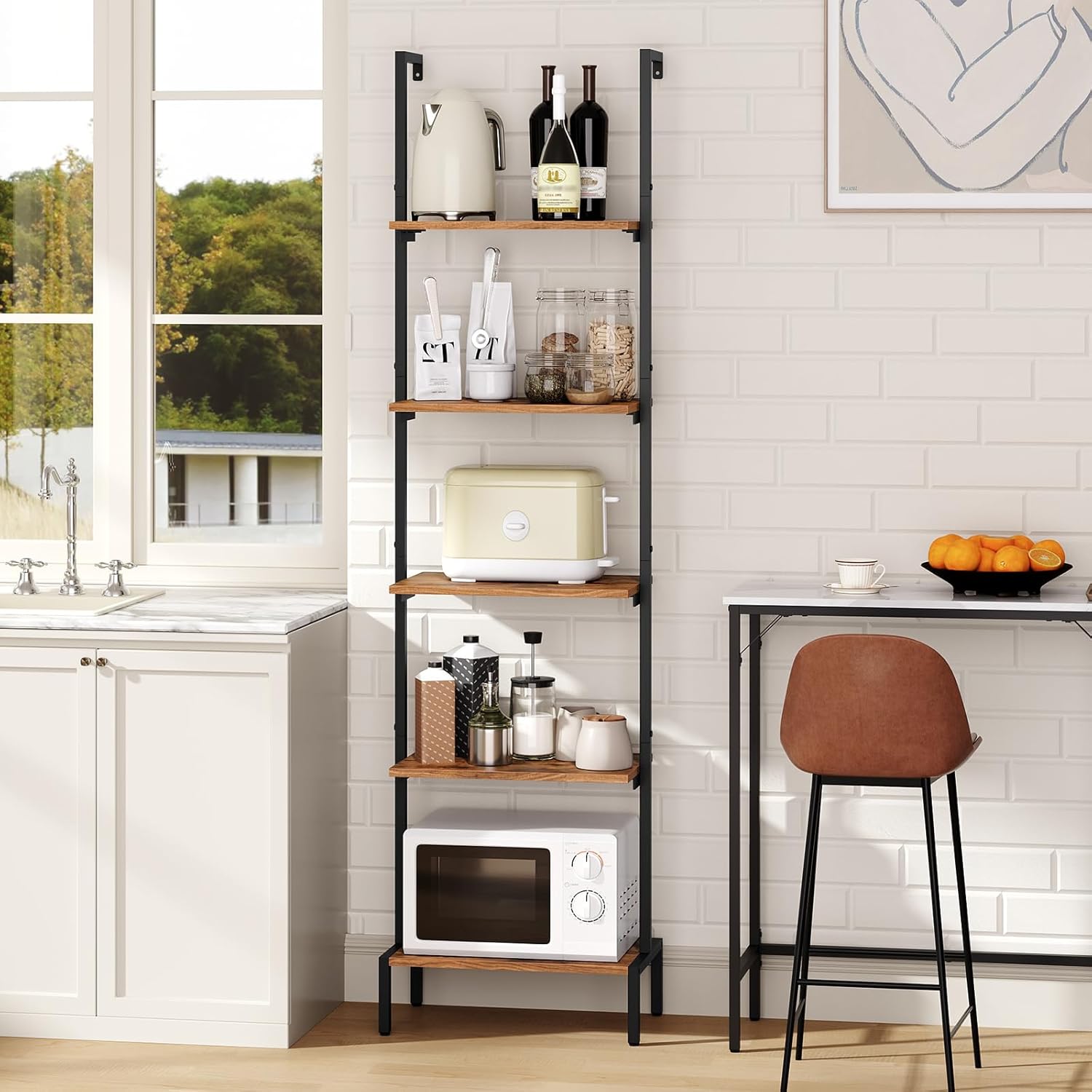 MAHANCRIS 5-Tier Ladder Shelf used in a kitchen, holding bottles, jars, and a toaster.