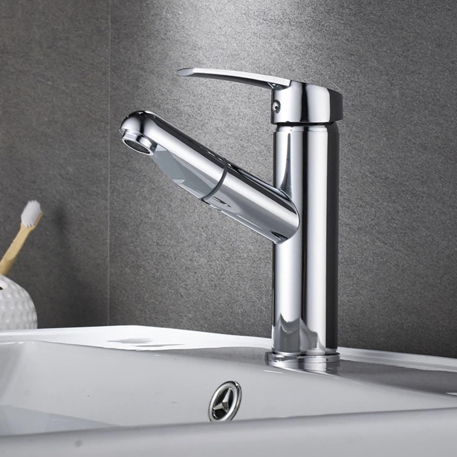 Grifo de lavabo mini en latón cromado con diseño elegante y compacto para baño