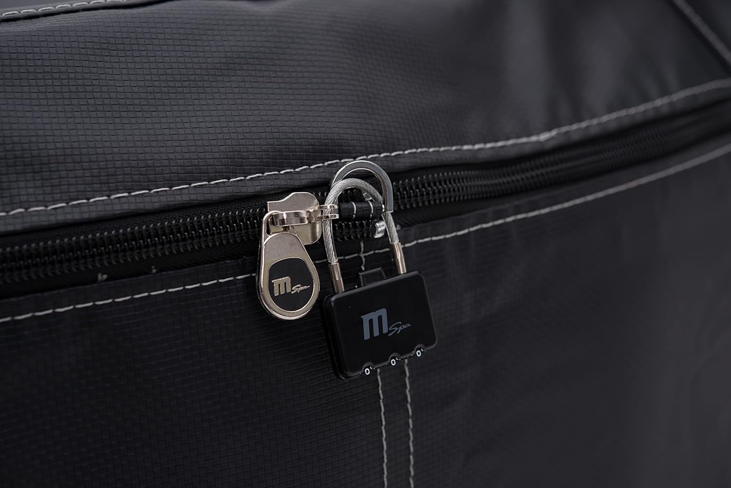 Close-up of the MSpa hot tub cover zipper with a security lock