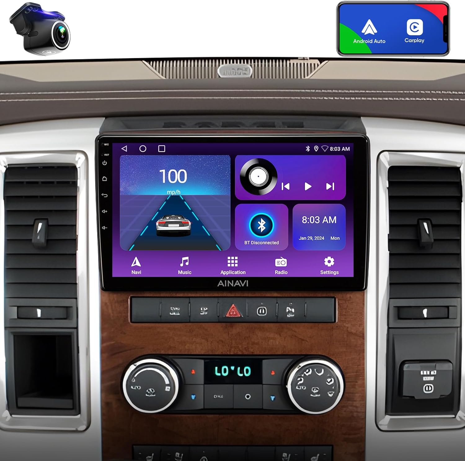 AINAVI 10-inch car stereo installed in a Dodge Ram dashboard, displaying the main interface with speed, music, and navigation icons.