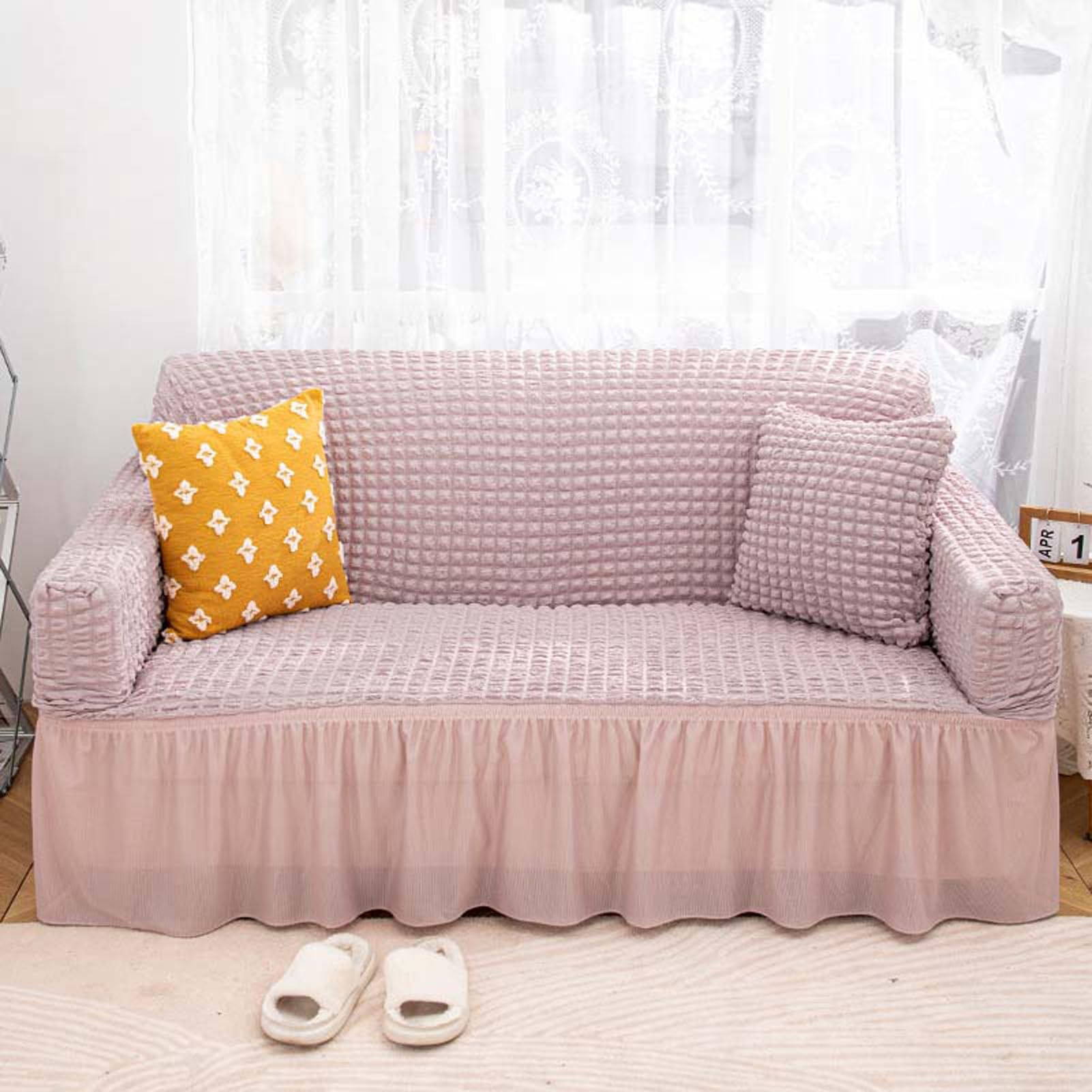 Housse de canapé extensible lavable pour préserver votre salon lors des moments en famille