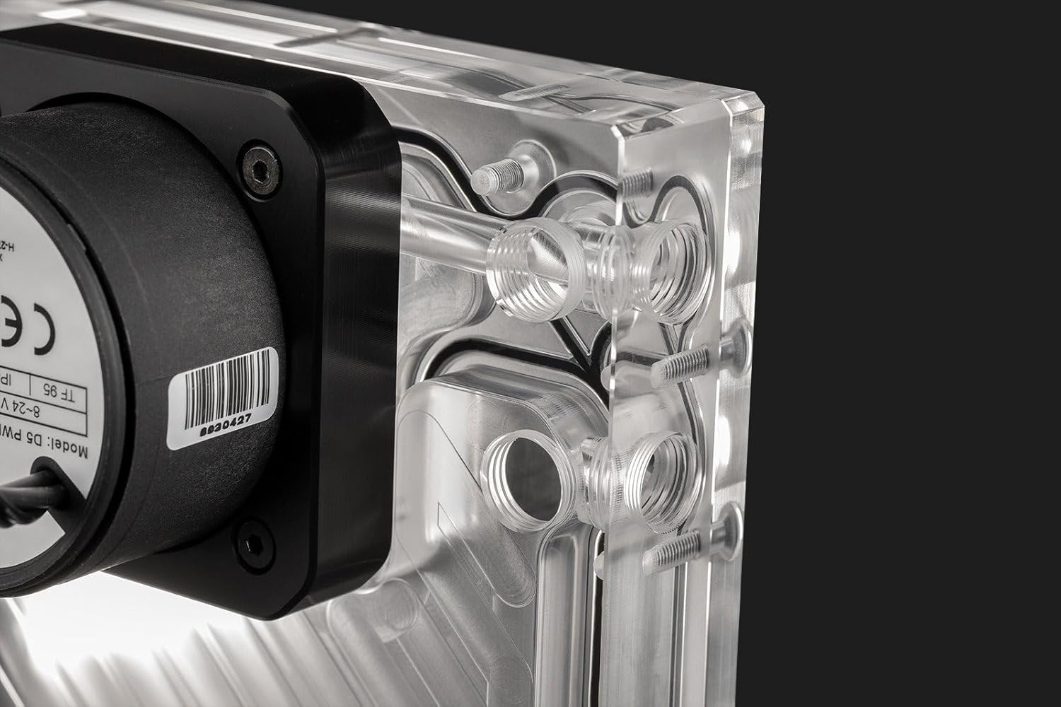 lateral view showing the D5 pump attached to the reservoir and multiple G1/4 inch ports