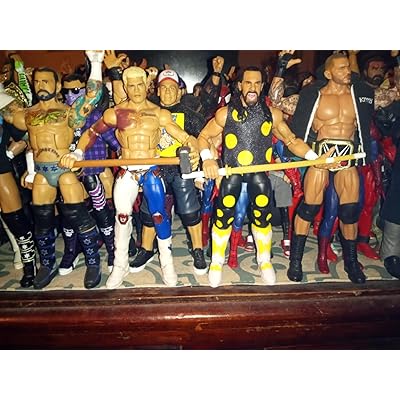Mattel WWE Elite Action Figure & Accessories, 6-inch Collectible Seth Rollins with 25 Articulation Points, Life-Like Look & Swappable Hands price in UAE | Amazon UAE
