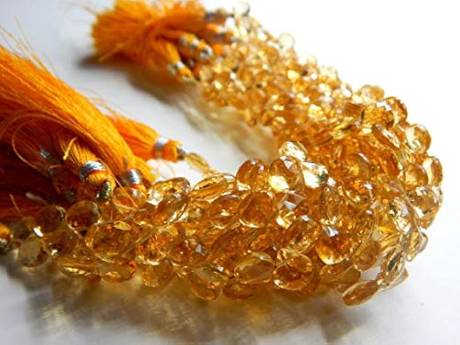 Citrine facettée en briolette 7mm pour enfilage et montage de bijoux