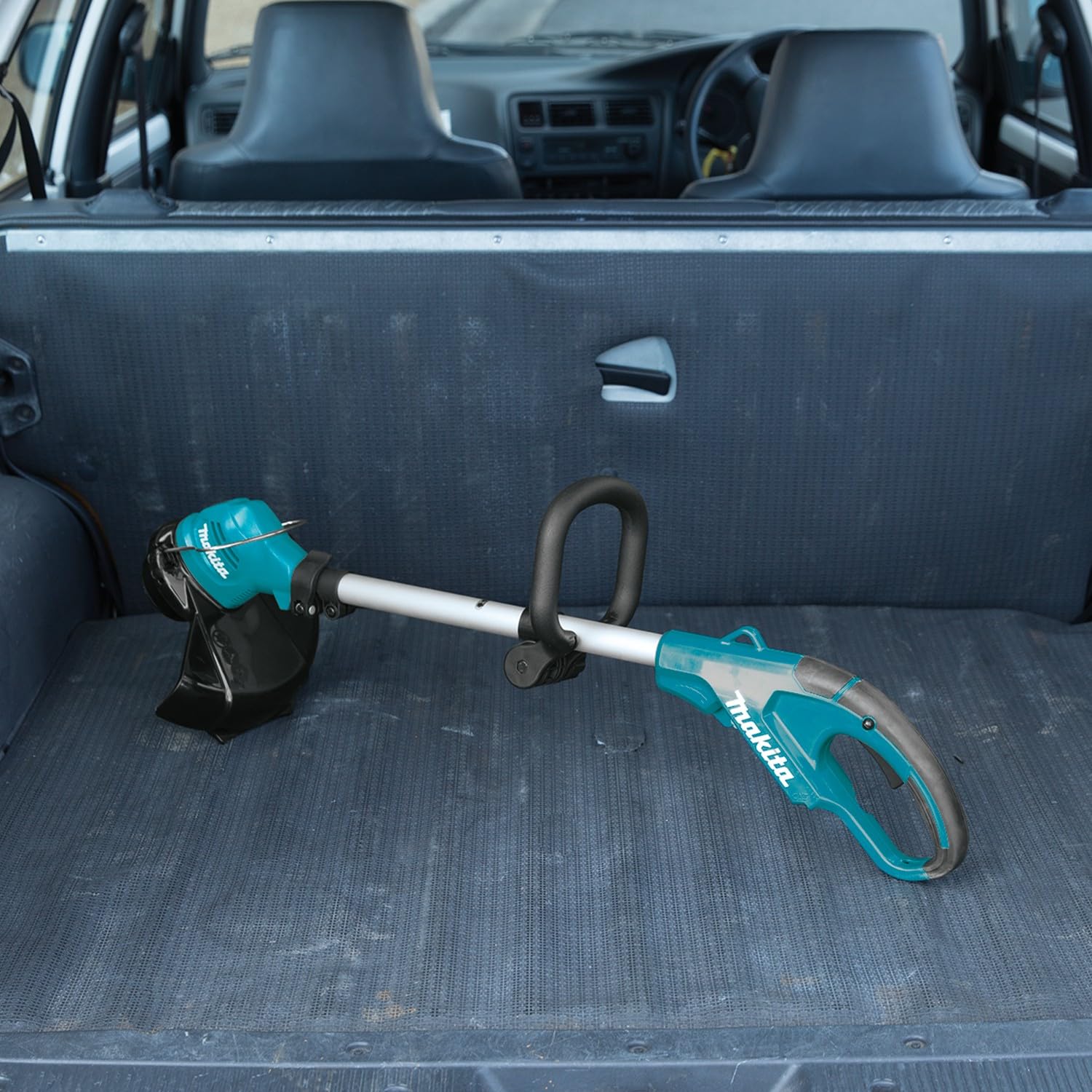 Makita Cortadora de césped inalámbrica UR100DZ de 10,8 V (sin batería, sin cargador), azul/plata