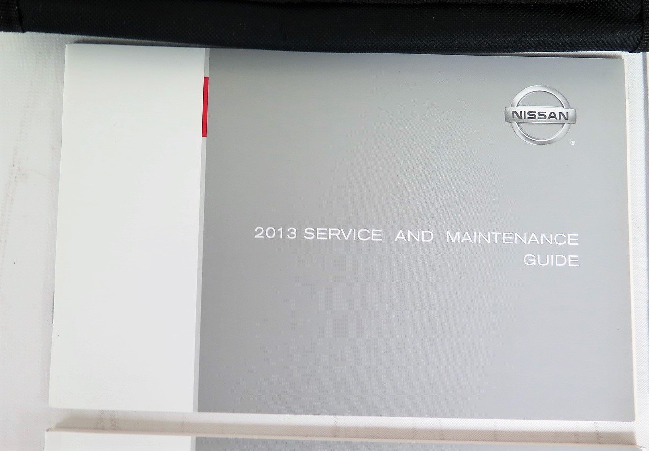 Front cover of the 2013 Nissan Service and Maintenance Guide