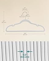 Vista 78 de SONGMICS UCRF029W05 - Paquete de 50 ganchos de terciopelo antideslizantes para trajes con muescas para el hombro, barra para pantalones, gancho