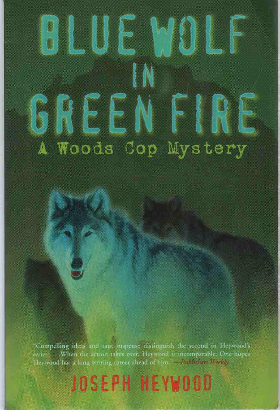 Buy Blue Wolf in Green Fire (Woods Cop Mysteries) — BookShops.in
