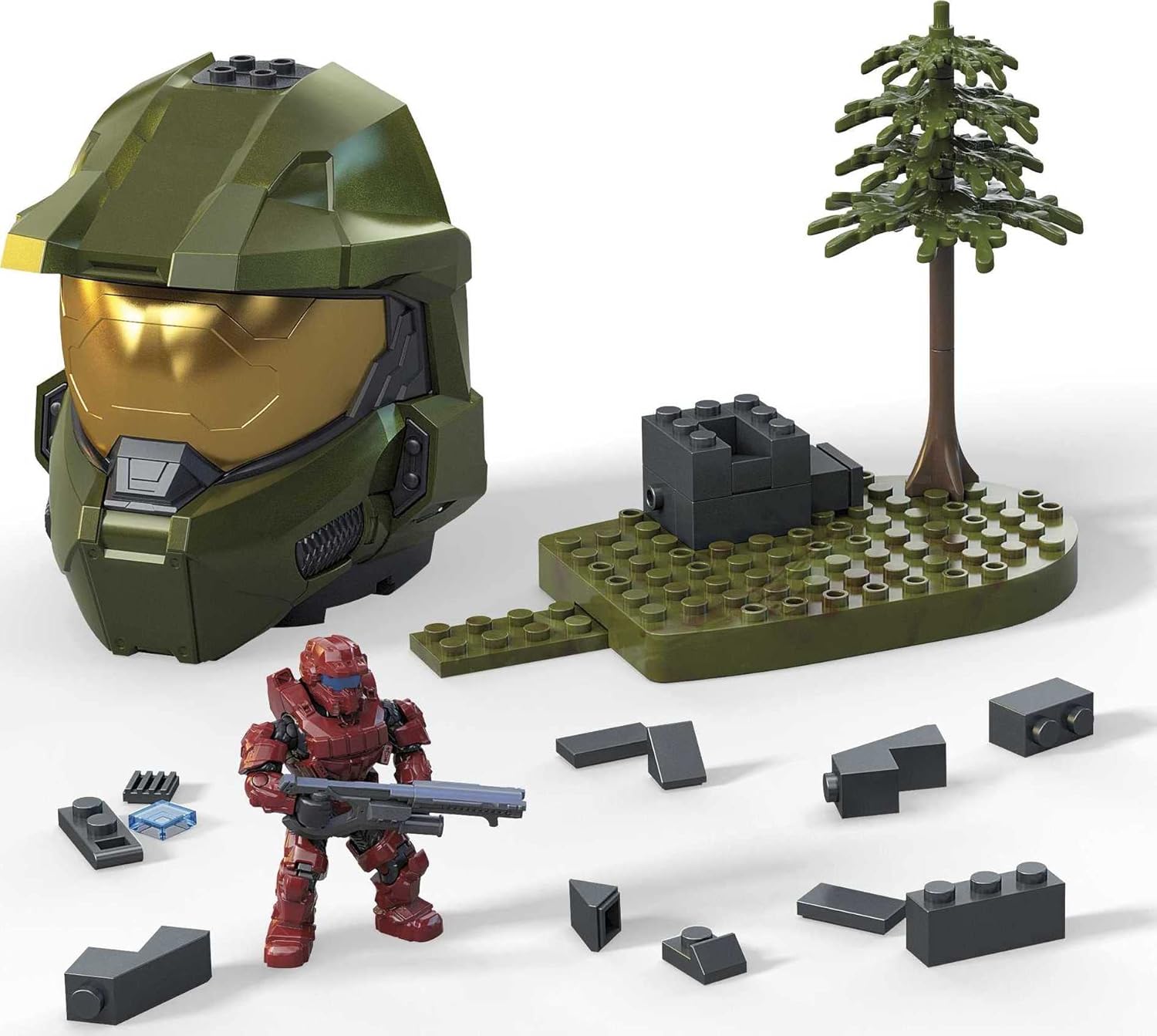 Components of the Mega Construx Halo HHJ02 Reserves set, including the Spartan helmet, a Spartan figure, a buildable terrain base with a tree, and various loose building blocks.