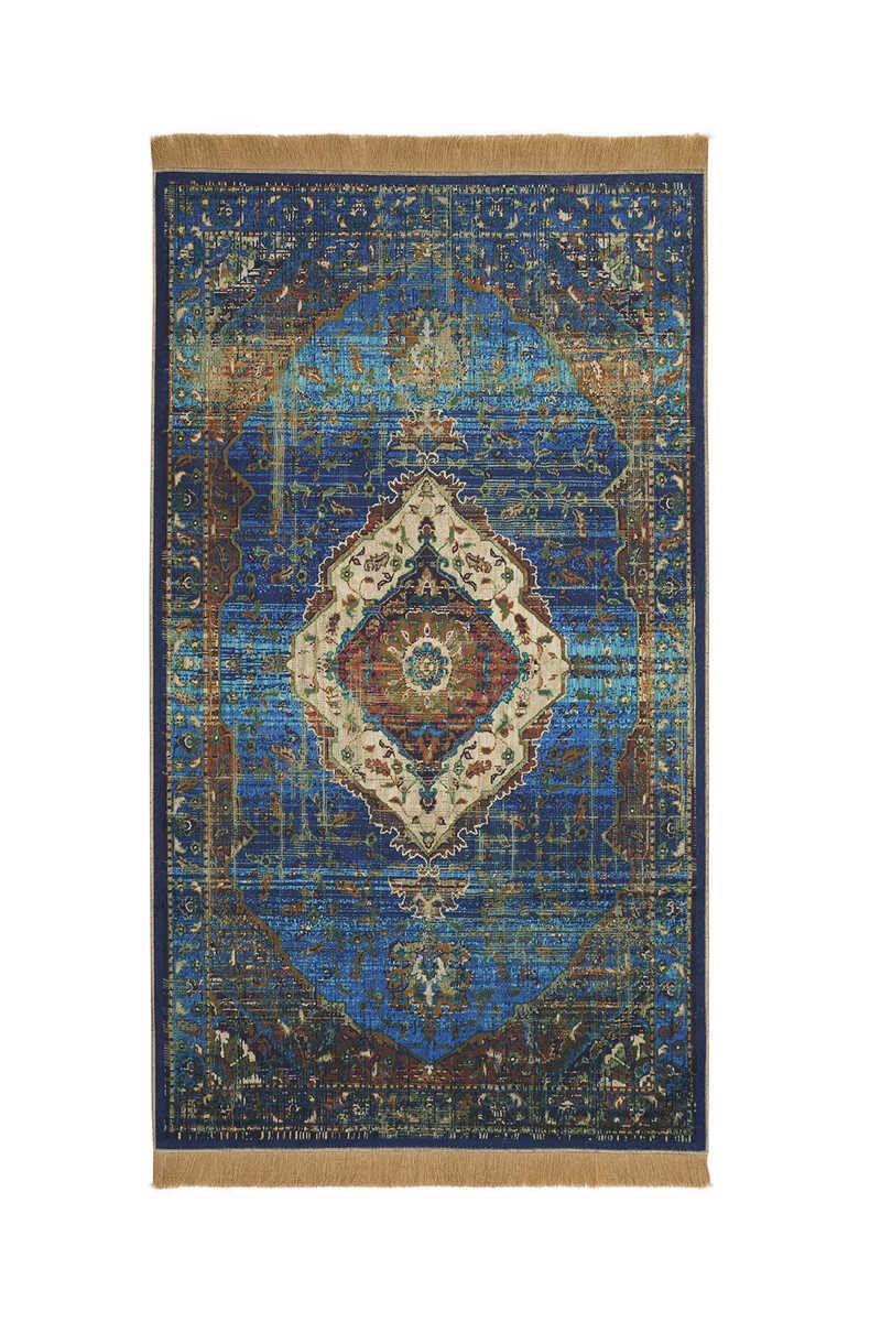 Tapis de prière luxe bleu avec motifs soignés et finitions haut de gamme