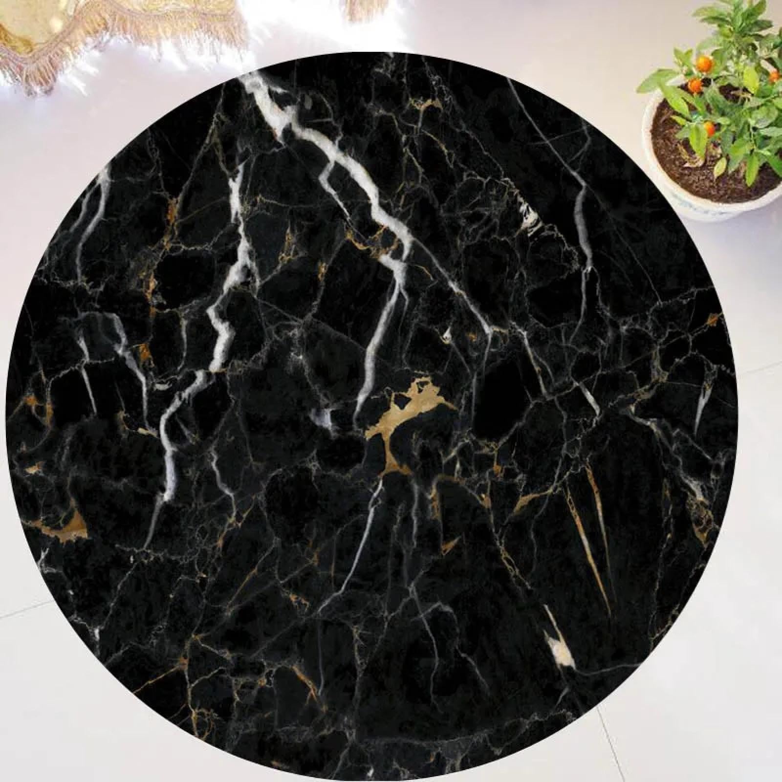 Tapis rond abstrait marbre noir pour sublimer votre salon cosy