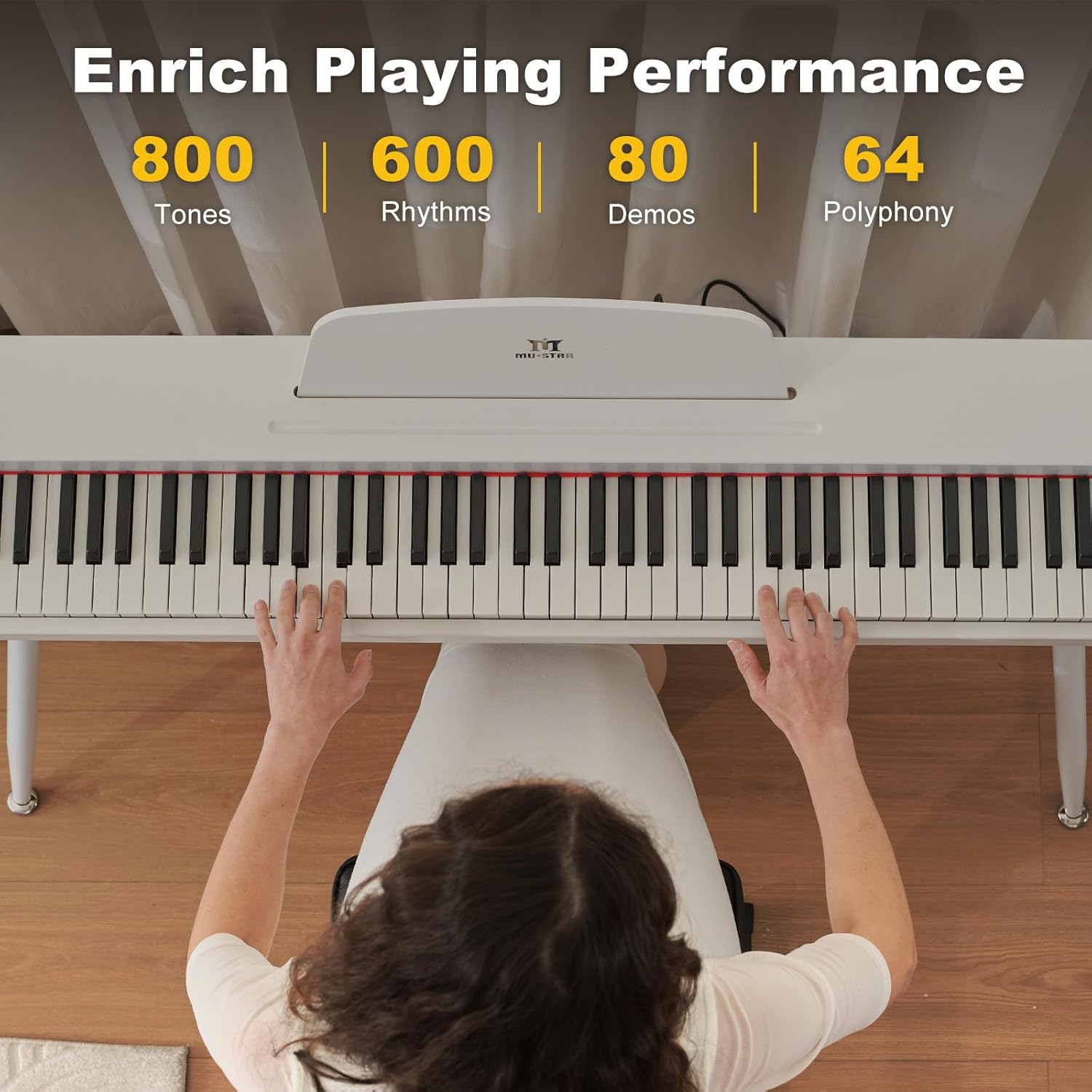 Overhead view of a person playing the MUSTAR digital piano, with text overlays indicating 800 Tones, 600 Rhythms, 80 Demos, and 64 Polyphony.