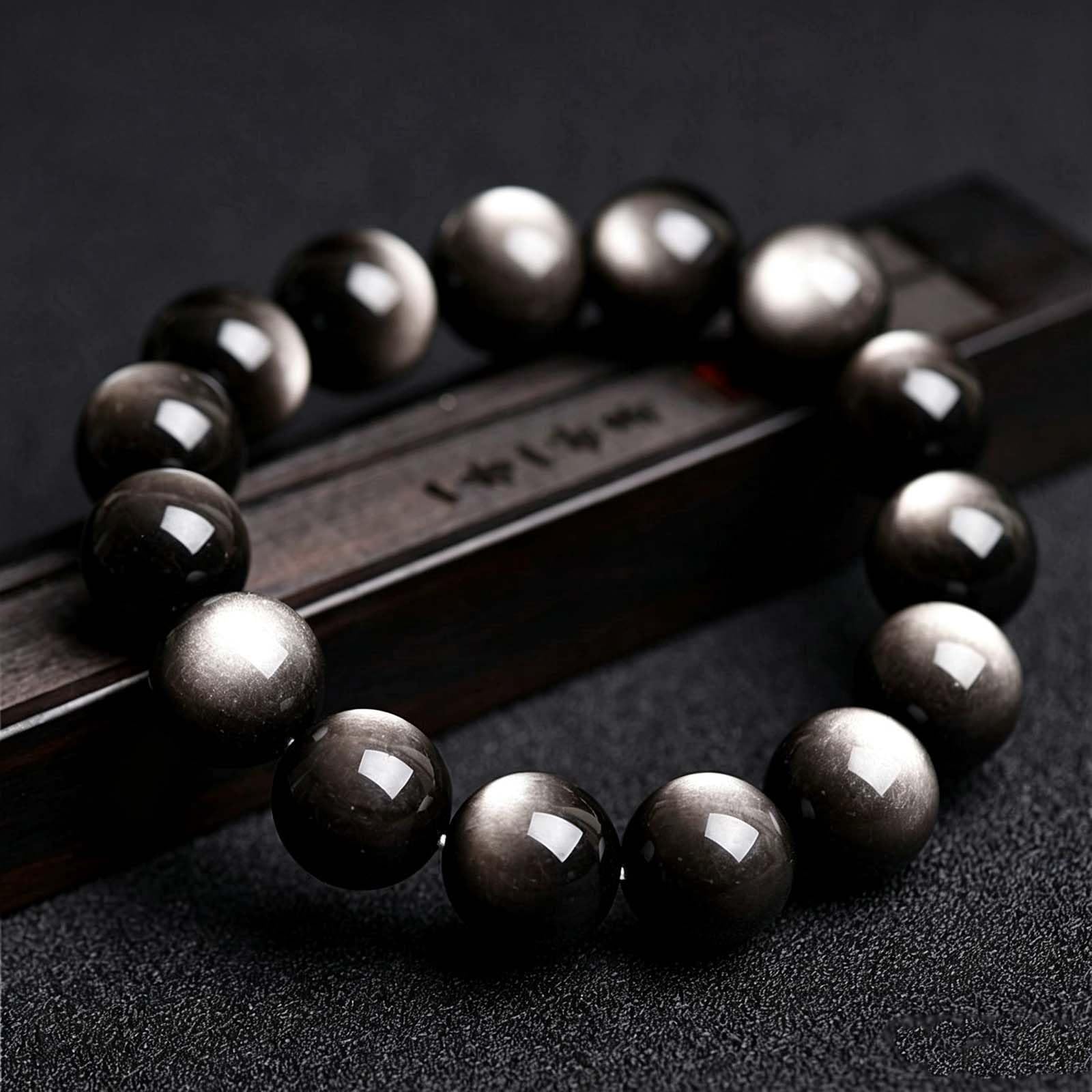 Bracciale con Perline di Ossidiana con lucentezza d'Argento