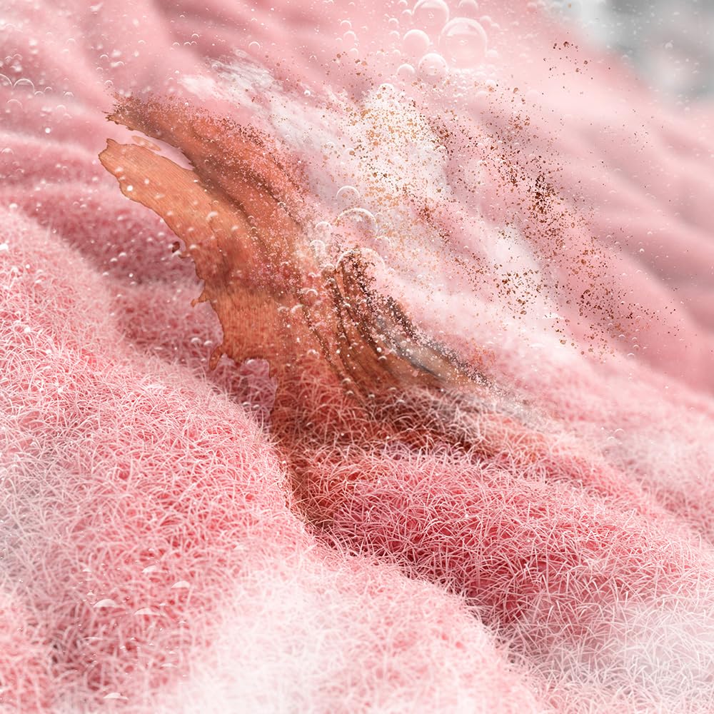 Washing machine with an overlay graphic depicting steam inside the drum, indicating the SteamMax/Spa Care function