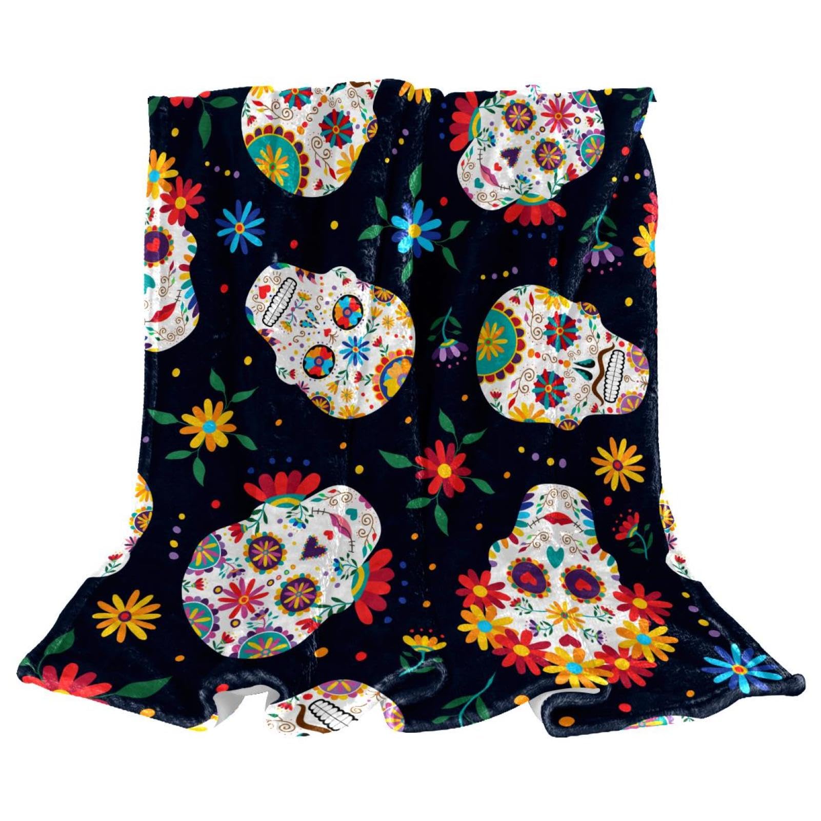 Couverture polaire crâne floral pour vos soirées cocooning au canapé