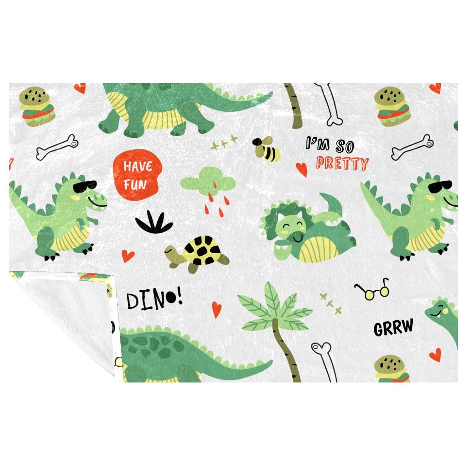 Couverture dinosaure verte pour lit enfant et canapé cozy 150x100 cm