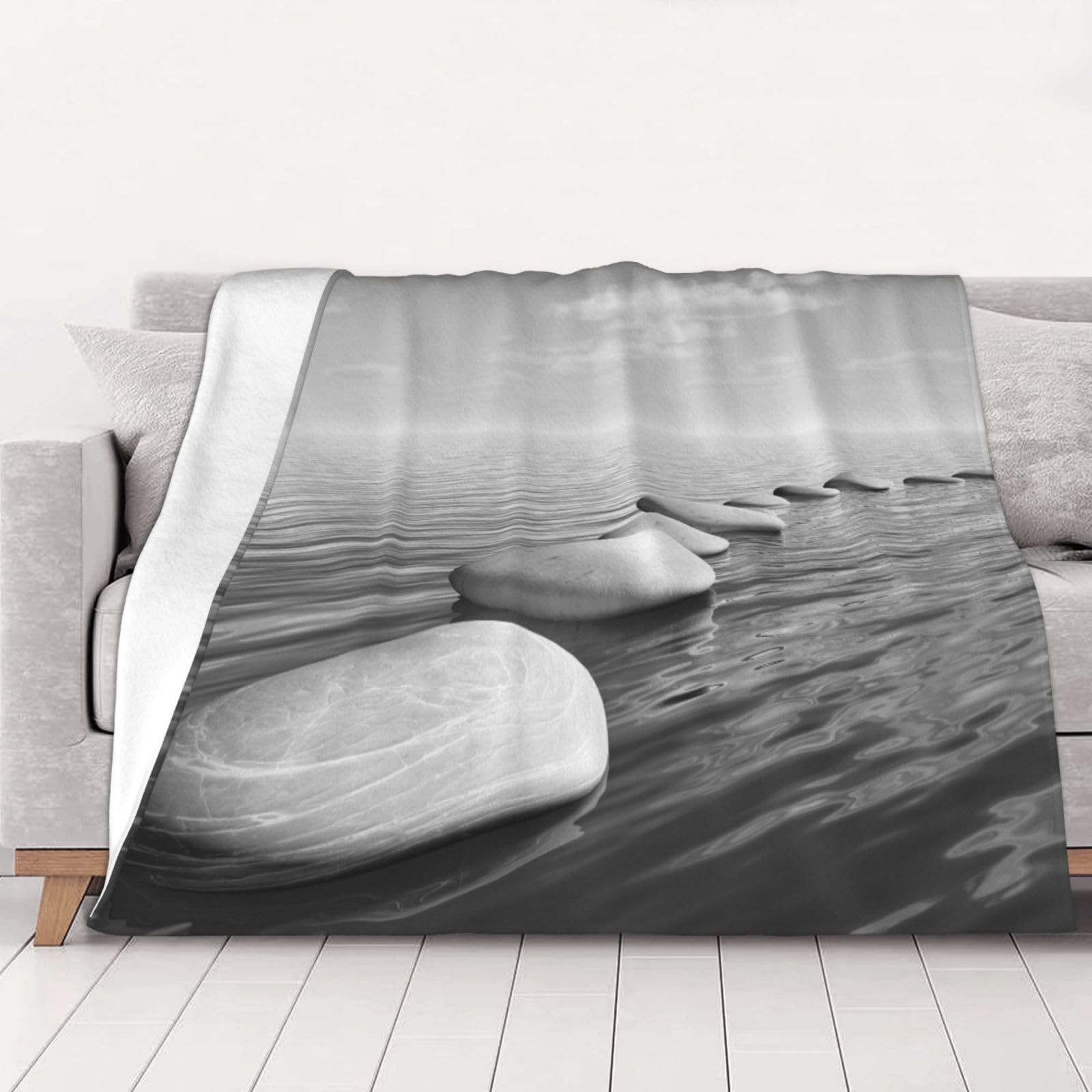 Couverture flanelle pierres zen pour vos soirées cocooning