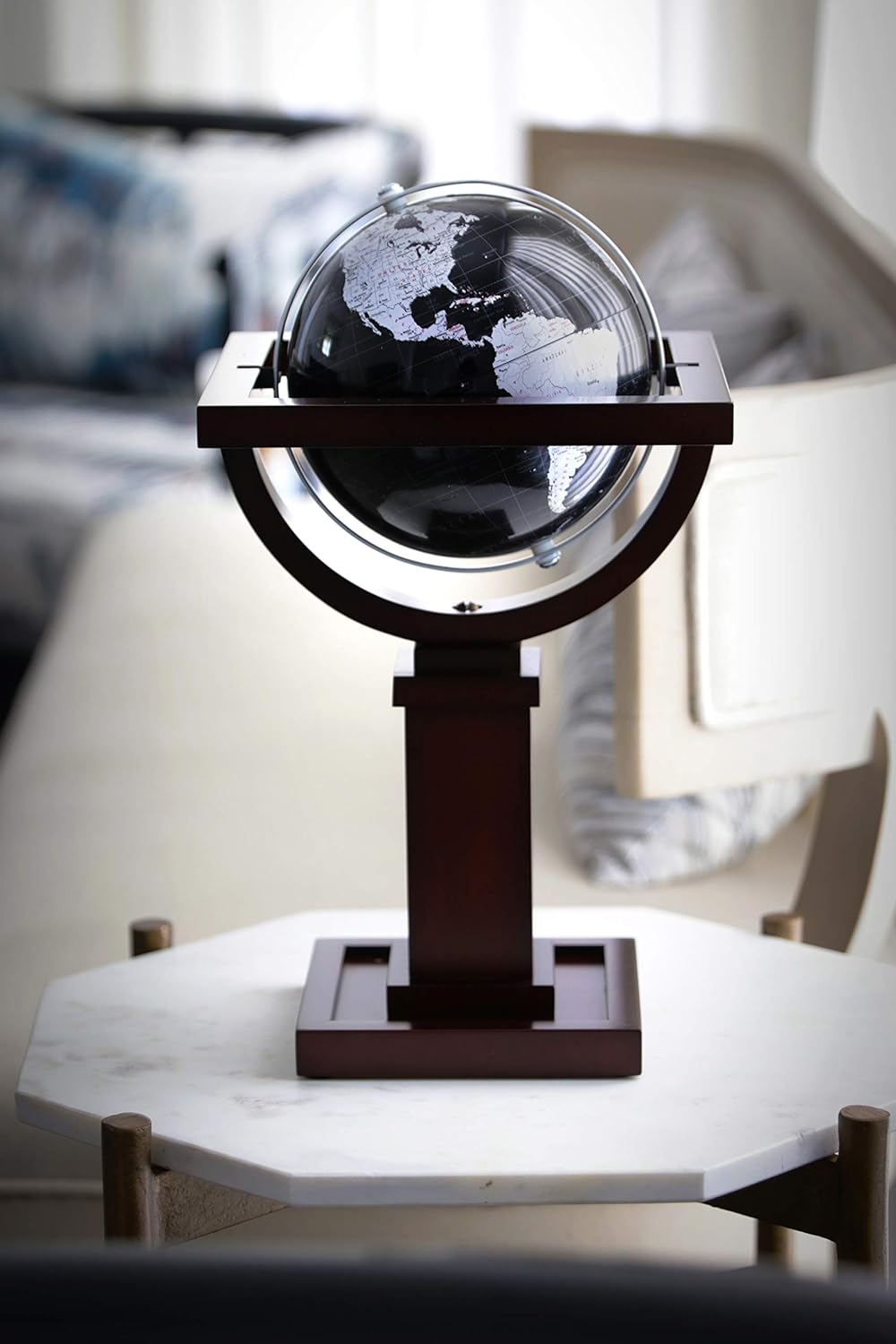 Frank Lloyd Wright Mini Wright 6" Diameter Globe, USA Cartography with Antique Globe Ball and Solid Woodl Base. A smaller version of our Wright Floor Globe is the perfect table or desktop globe for any home or office. The globe stand is an authentic reproduction from a drawing found in the Frank Lloyd Wright Foundation archives. It is an unidentified concept for one of the Prairie Homes that Wright designed in the early 1900’s. This globe and stand are proportionately scaled from the large Wright Floor Globe.