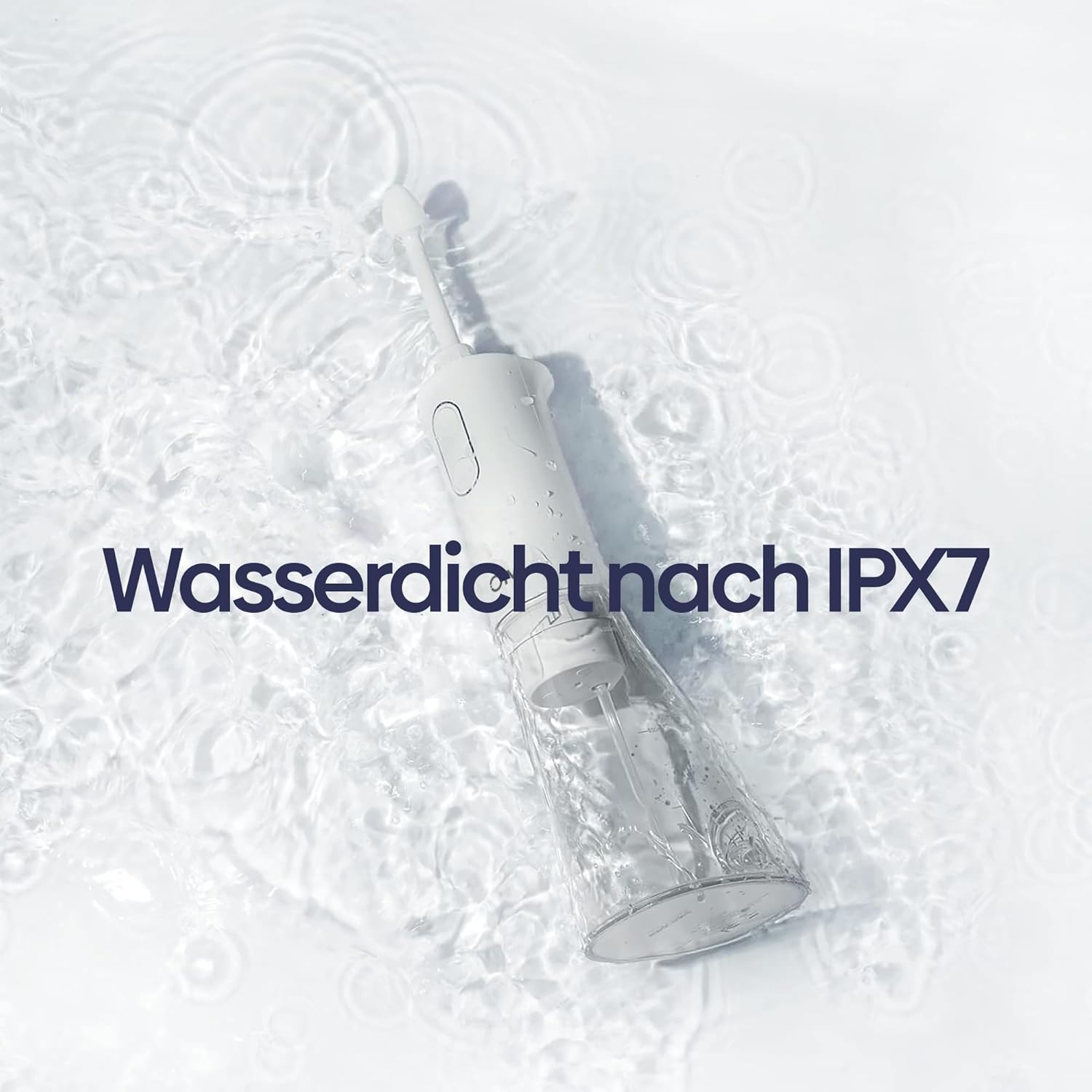 Olvy Nasal Irrigator being rinsed under water, demonstrating IPX7 waterproof rating