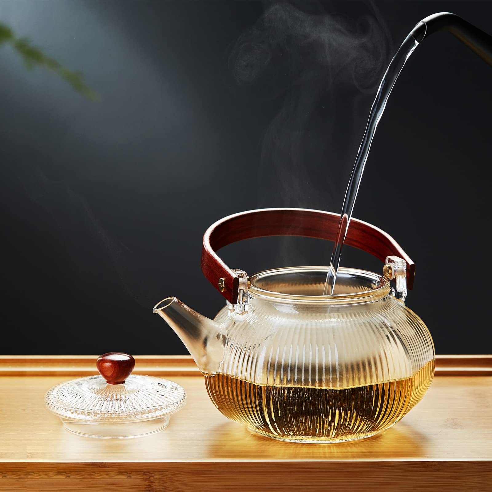 ころんとしたフォルムの可愛らしいガラスの急須 Amazon | ポカロティー 耐熱ガラスティーポットセット 縦縞硝子