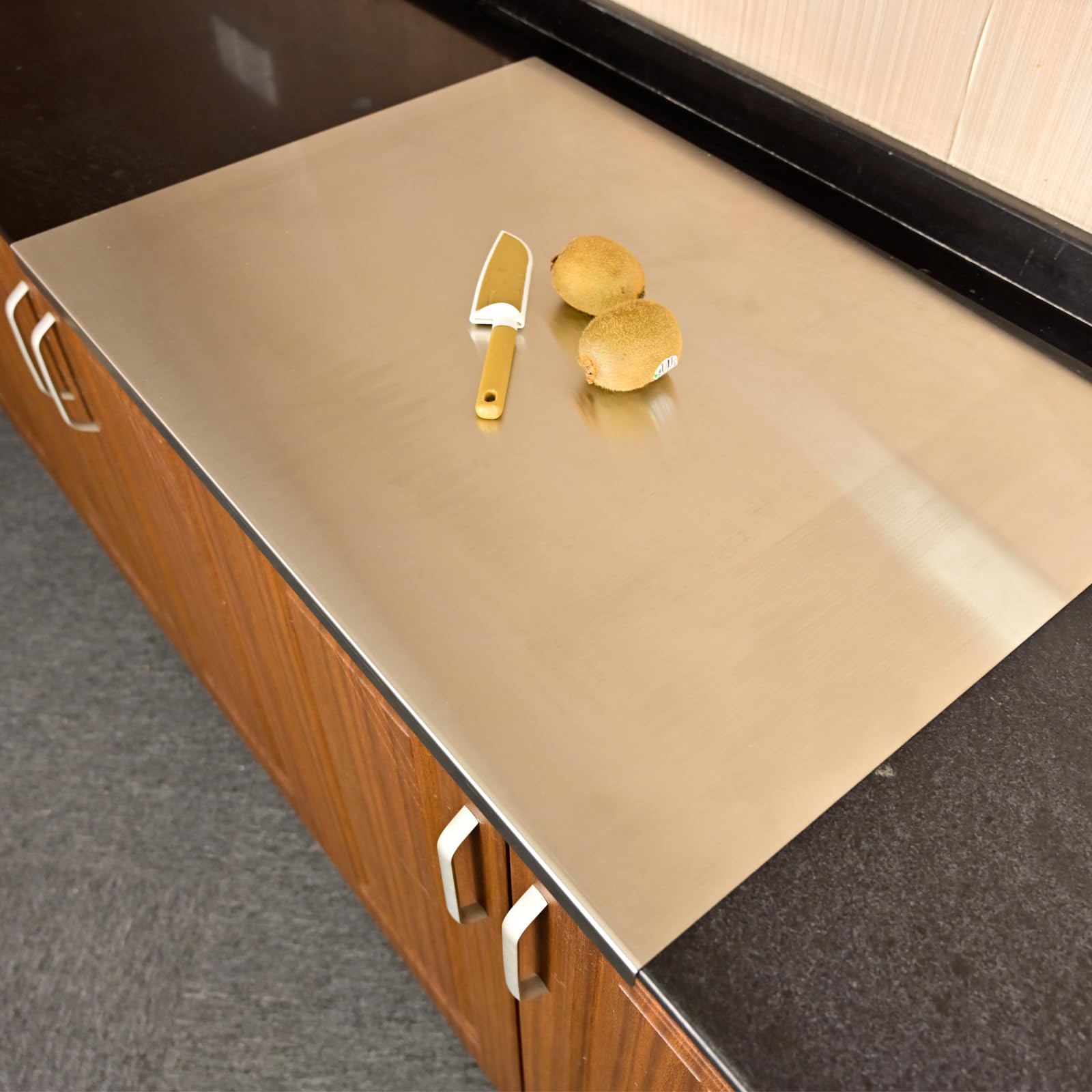 Photo 1 of **damaged**Mokapit 27.6"L x 19.7"W Cutting Board Stainless Steel Chopping Board Heavy Duty Kitchen Baking Board with Lip for Meat Vegetables Fruit Bread Fish Cheese Smooth And Easy to Clean